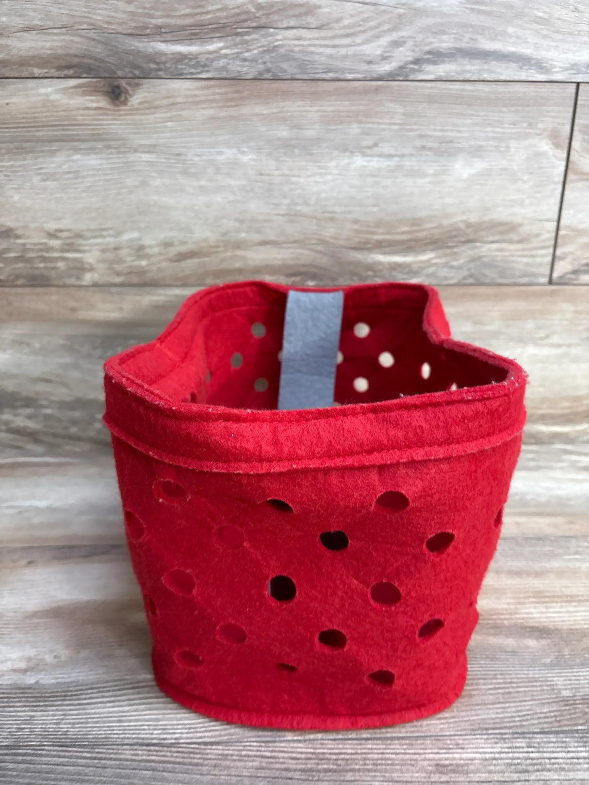 Red polka dot felt storage bin for kids toys or baby gear, perfect for nursery organization