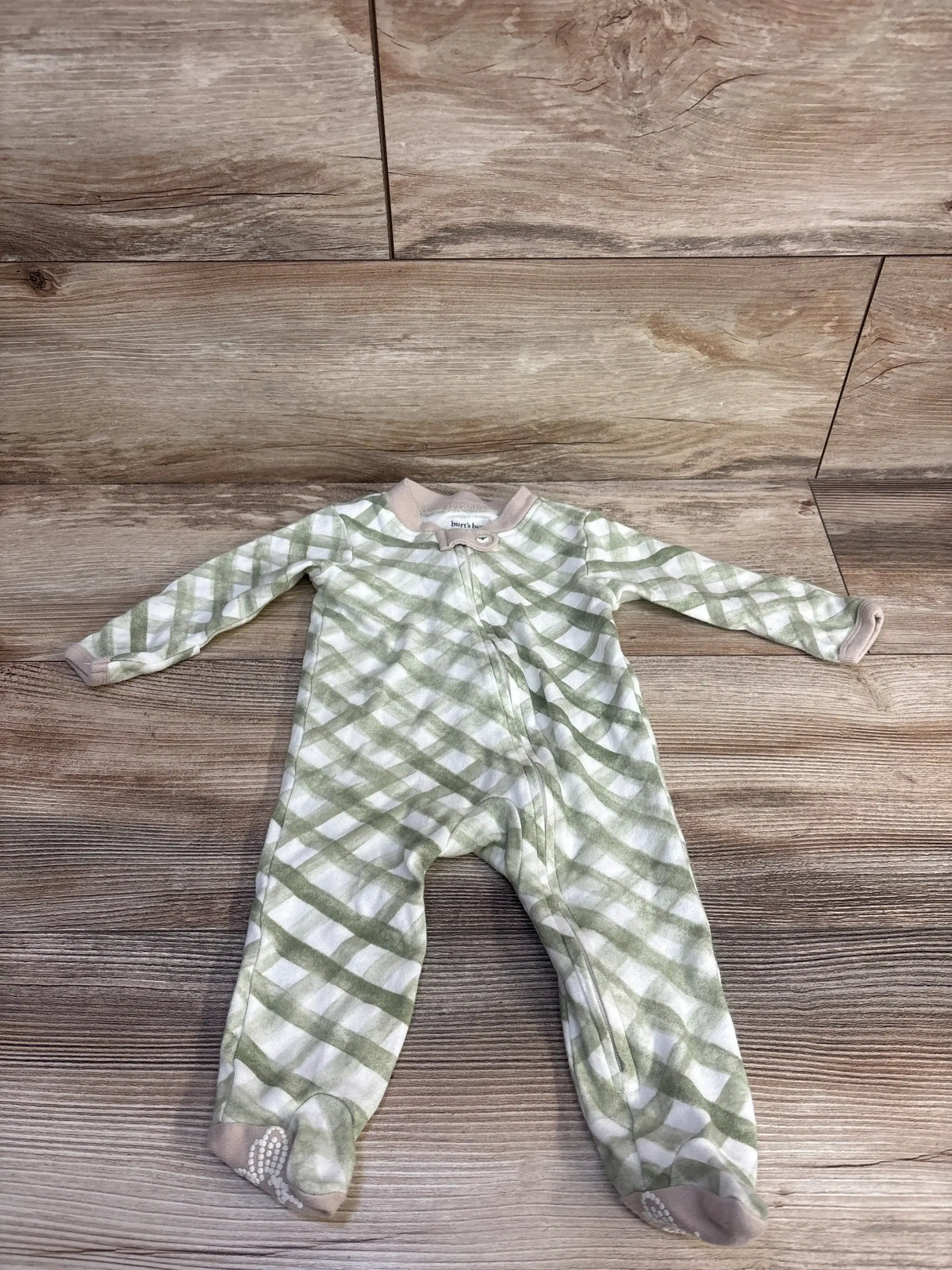 Front view of Burt’s Bees Baby green organic sleeper, size 0-3 months, with zipper and covered feet