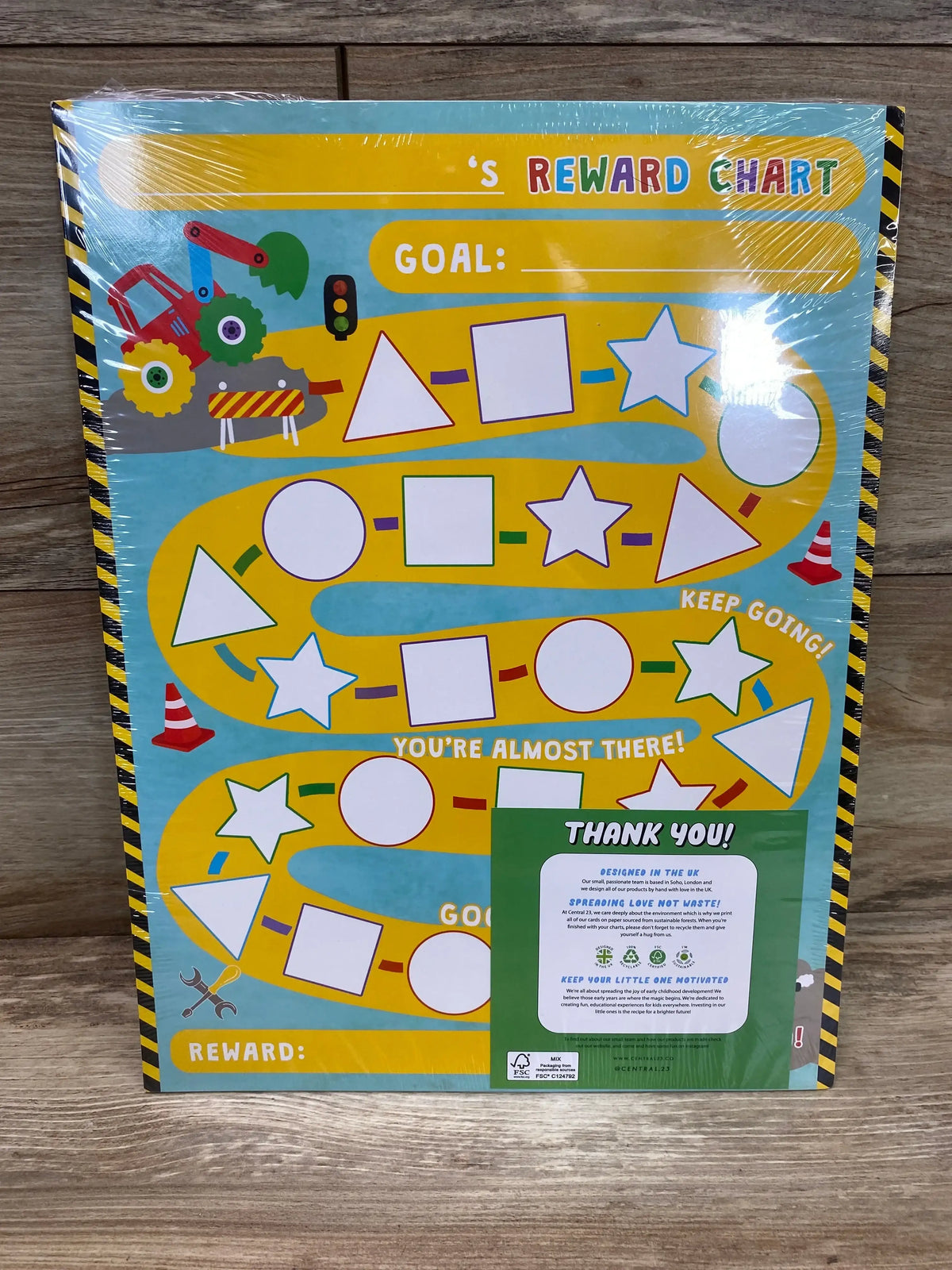 Front view of Central.23 reward chart with blank name line, ‘GOAL:’ and ‘REWARD:’ fields and yellow winding path with shape spots