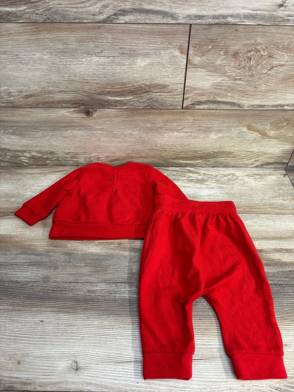 Front view of Baby Gap 2pc Velour Pullover Sweatshirt and Joggers in red with buttoned neckline and elastic waist