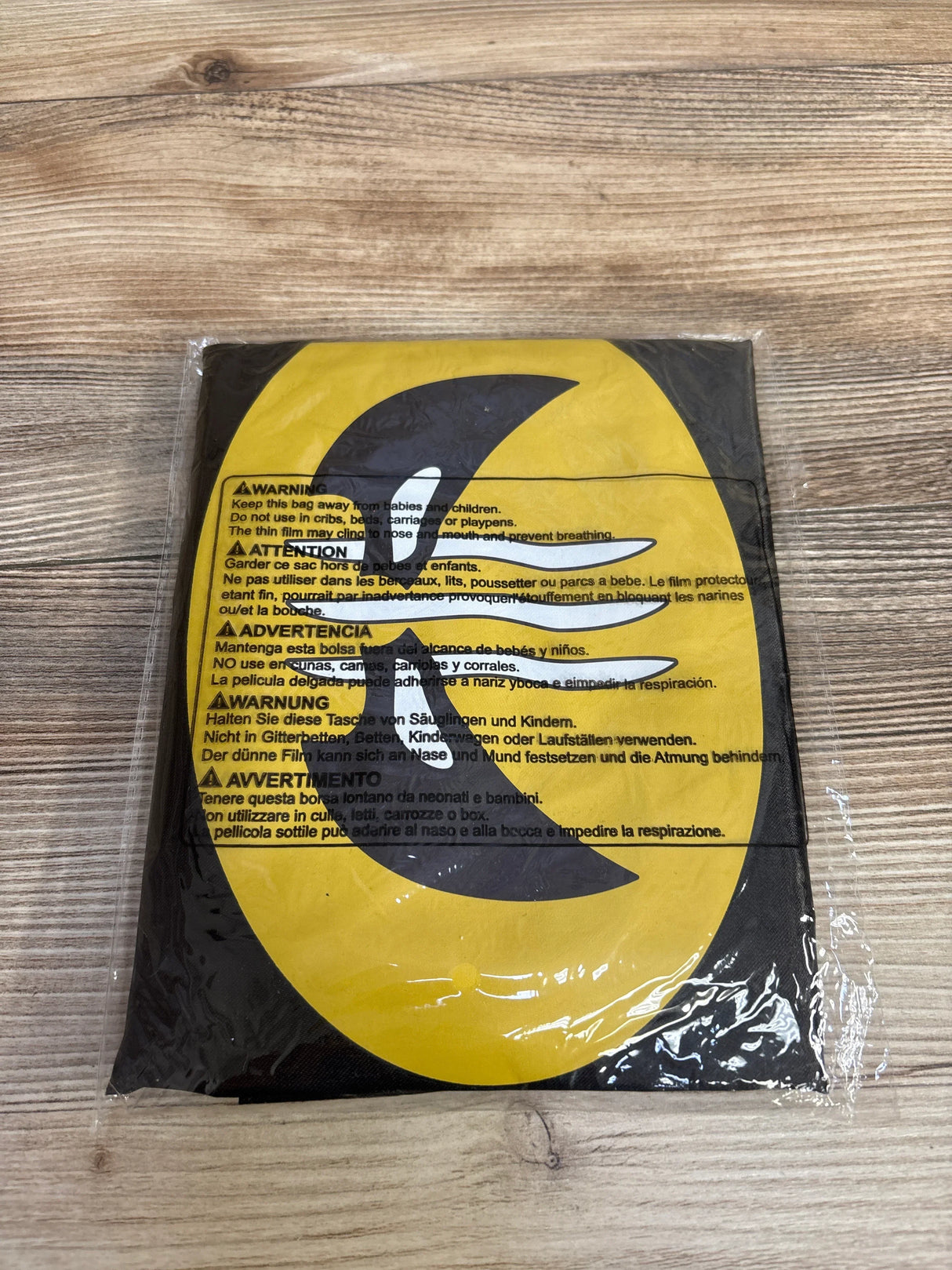 Warning label on baby product packaging, safety instructions for cribs, beds, strollers, and playpens