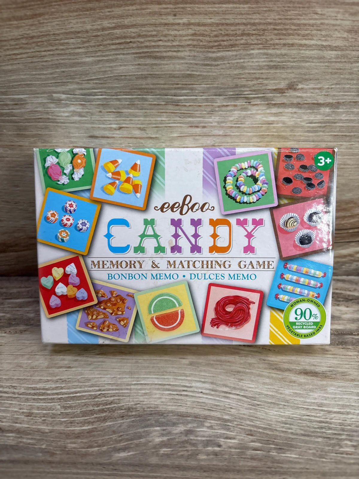 Front of eeboo Candy Memory & Matching Game box showing colorful candy tiles, 3+ and 90 percent recycled badges on wood