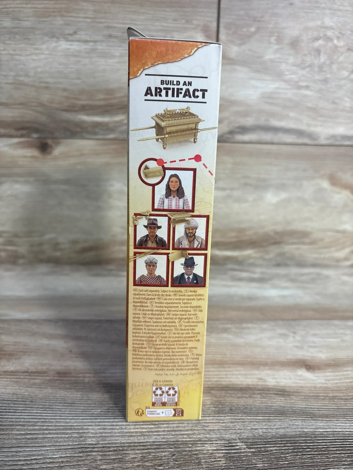 Build an Artifact toy box side with character photos and Ark of the Covenant illustration