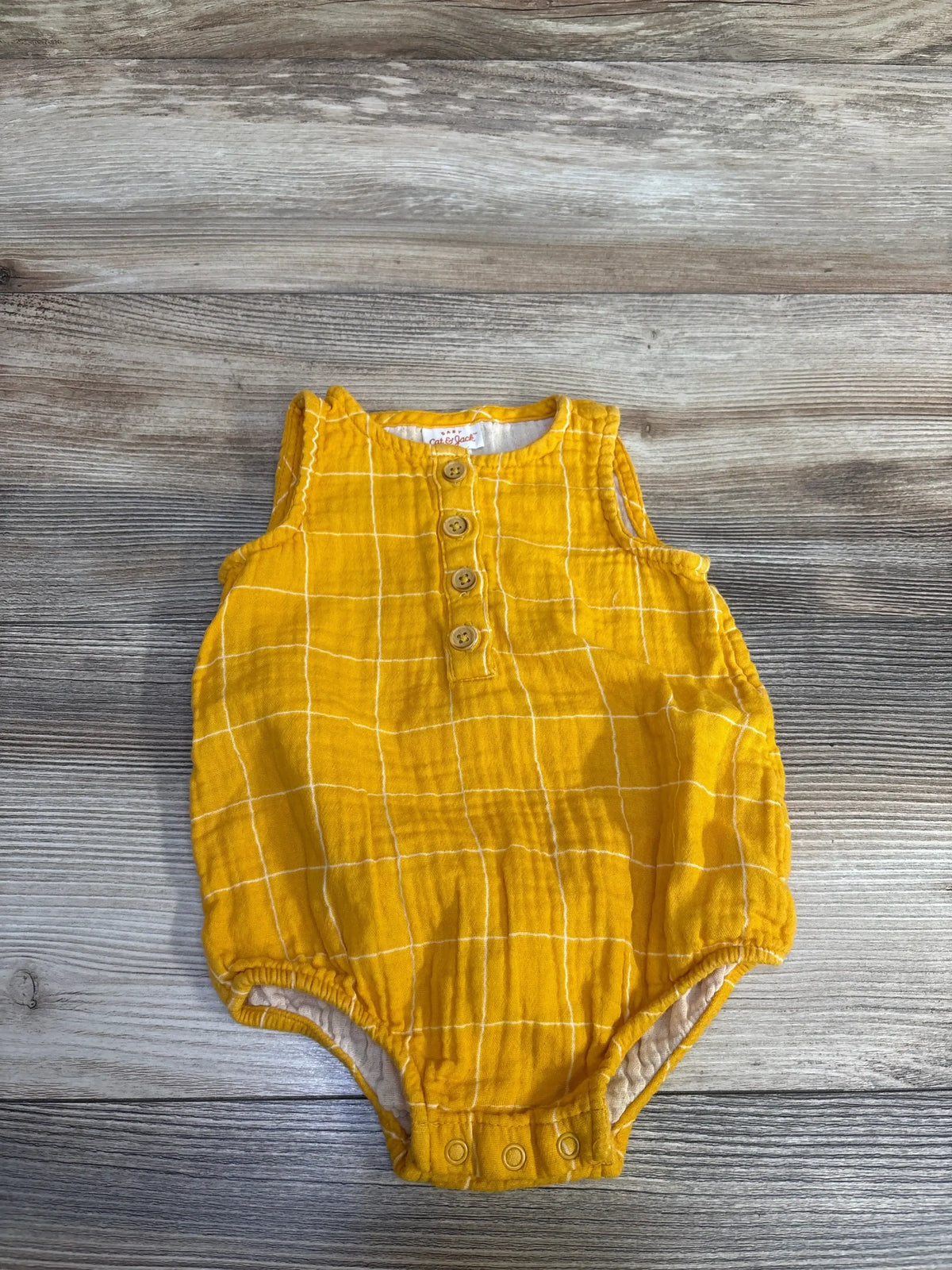 Front view of Cat & Jack yellow tank bubble romper, size 3-6 months, showing sleeveless top and elasticized bubble legs on white background