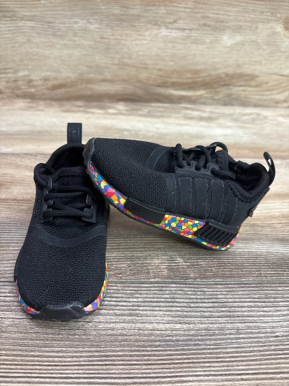 Adidas NMD_R1 El Mosaic Black Sneakers for kids with colorful patterned soles.