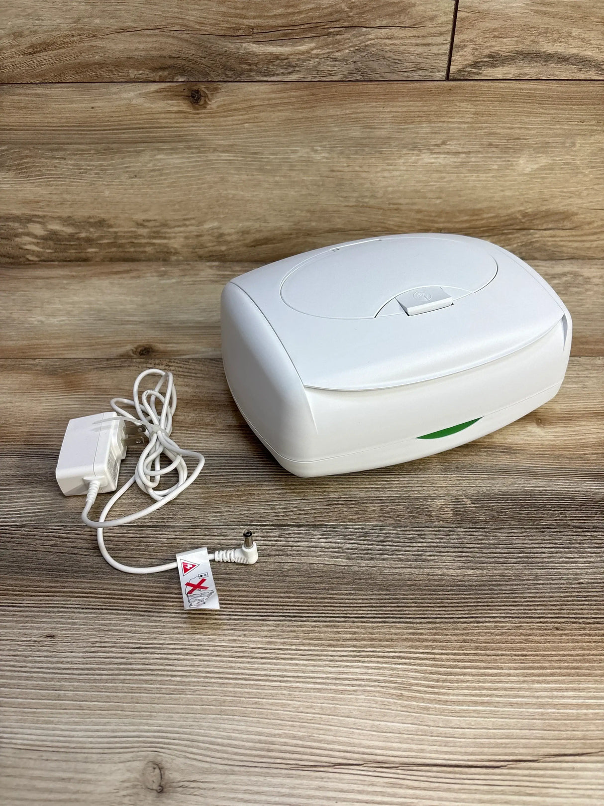 Front view of Prince Lionheart Ultimate Wipes Warmer showcasing curved lid and compact base on white background