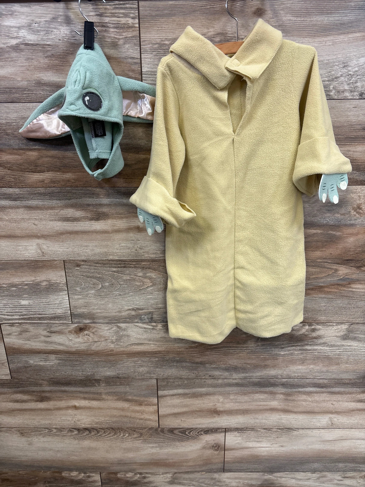 Baby Yoda costume with green hooded hat and yellow fleece robe, perfect for kids' dress-up or Halloween