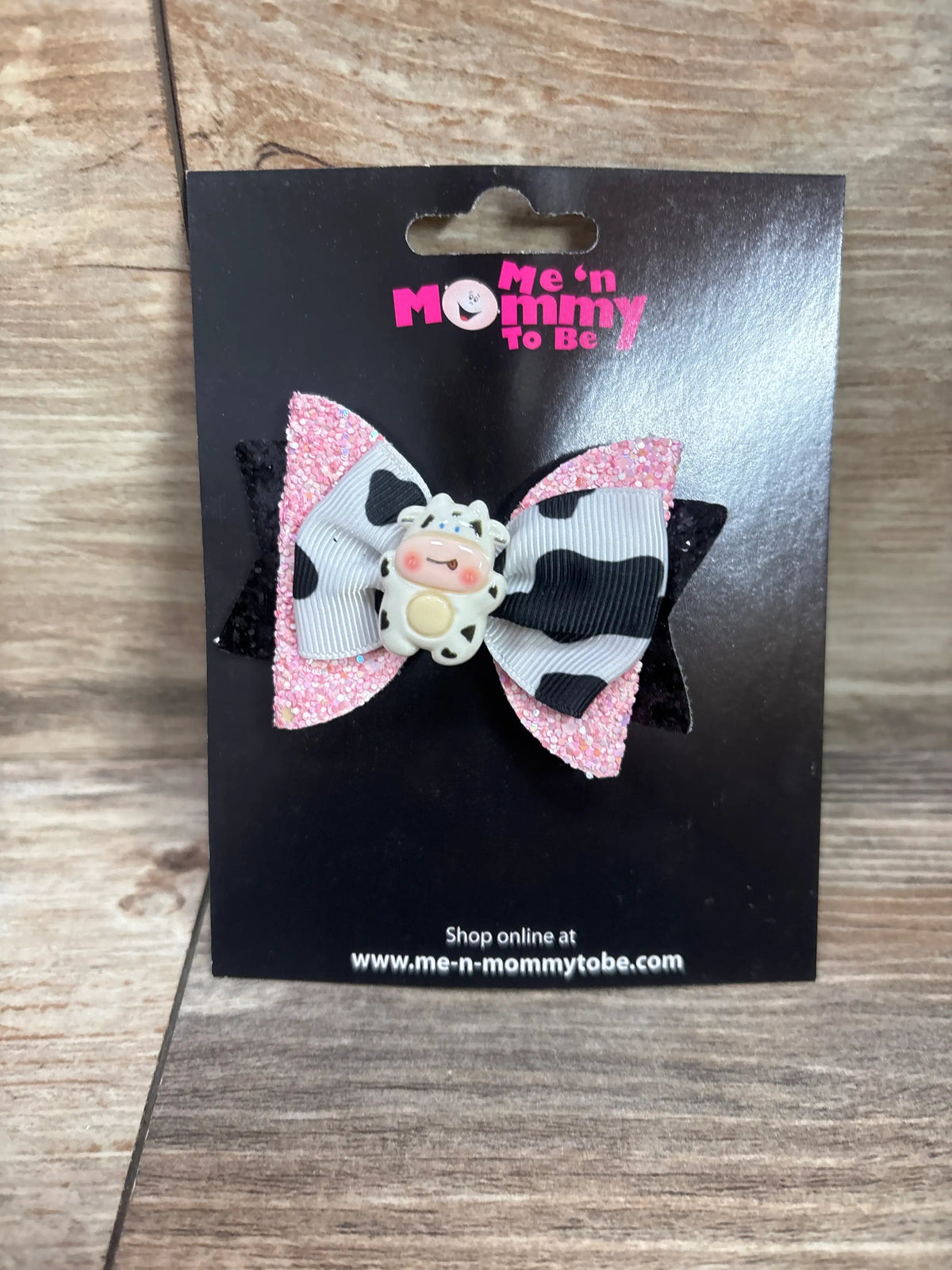 Pink glitter and cow print hair bow with a cute cow applique on a black Me 'n Mommy To Be card