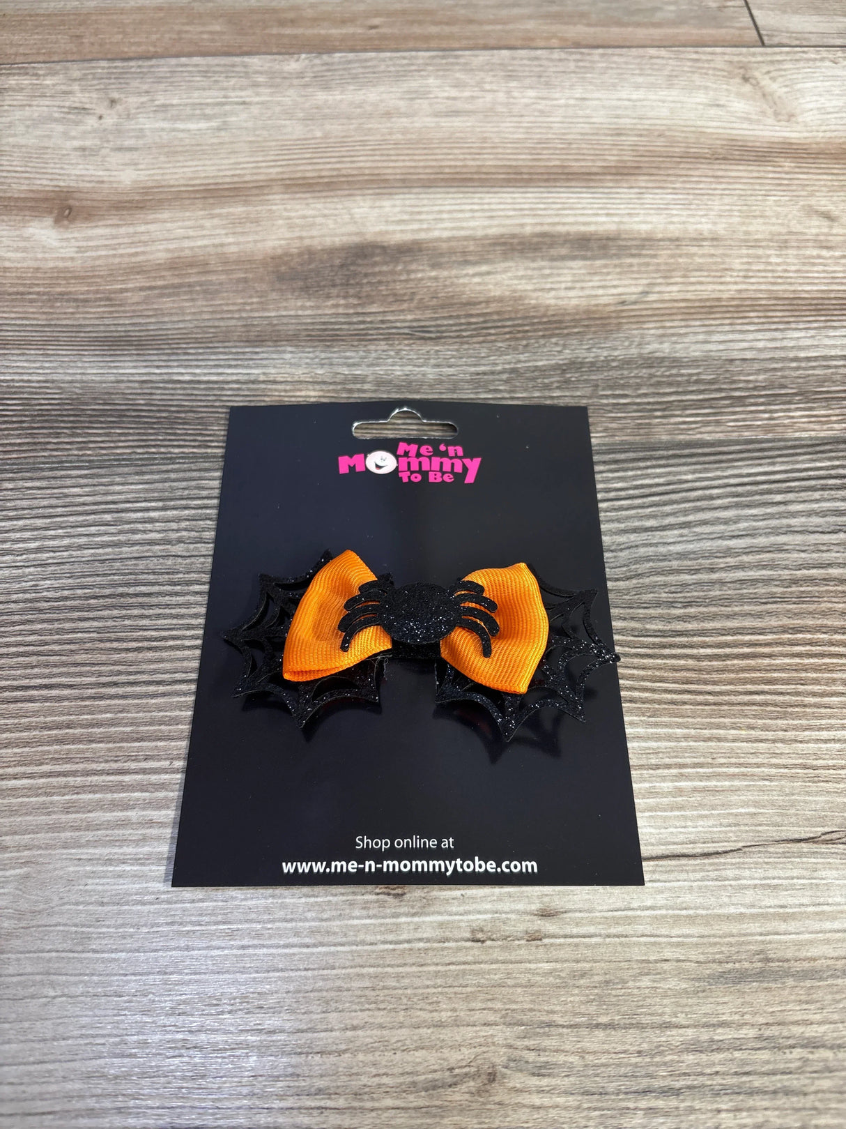 Orange Halloween bow with black glitter spider and web accents for kids' hair accessories