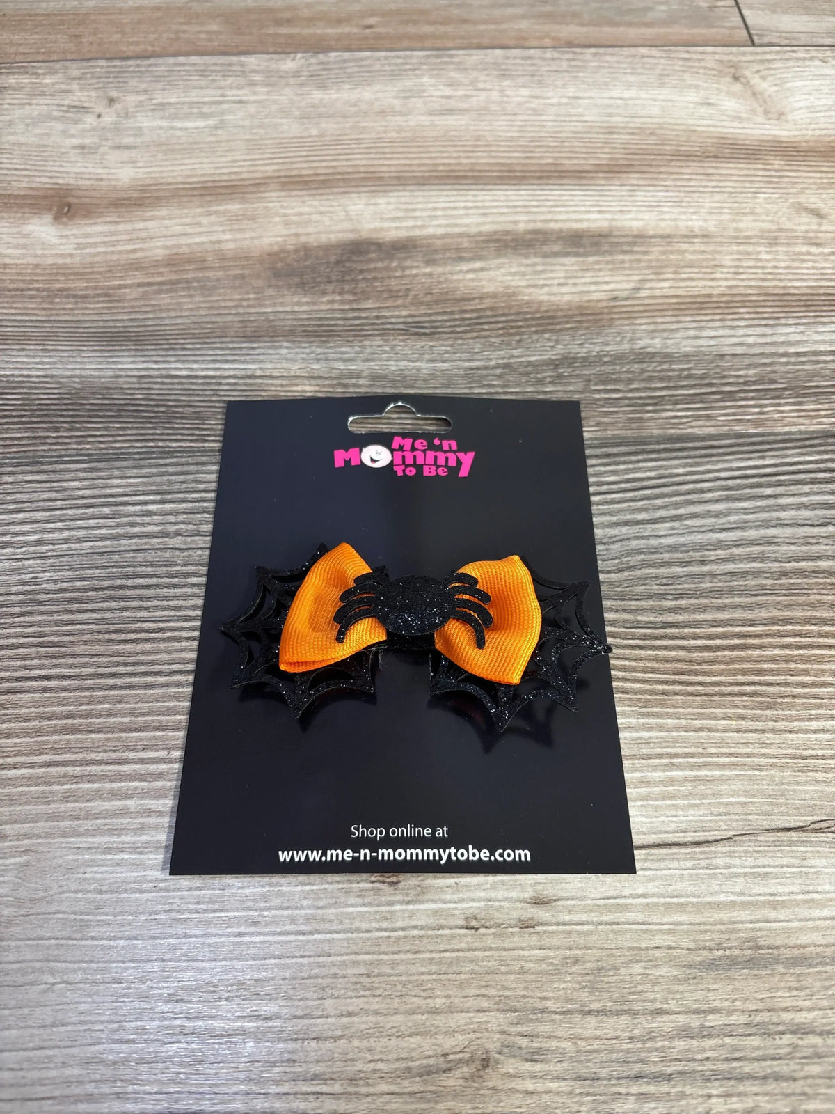 Orange Halloween bow with black glitter spider and web accents for kids' hair accessories