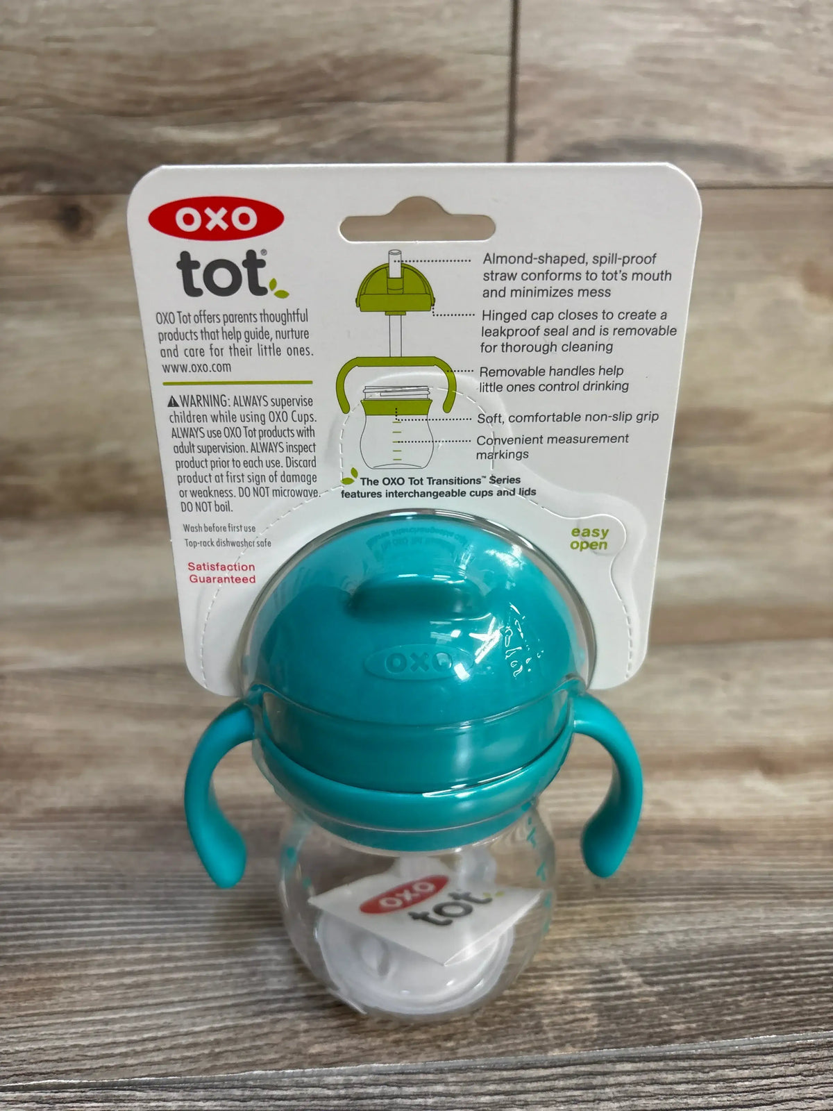 OXO Tot spill-proof sippy cup with handles, ideal for toddlers transitioning from bottles to cups.