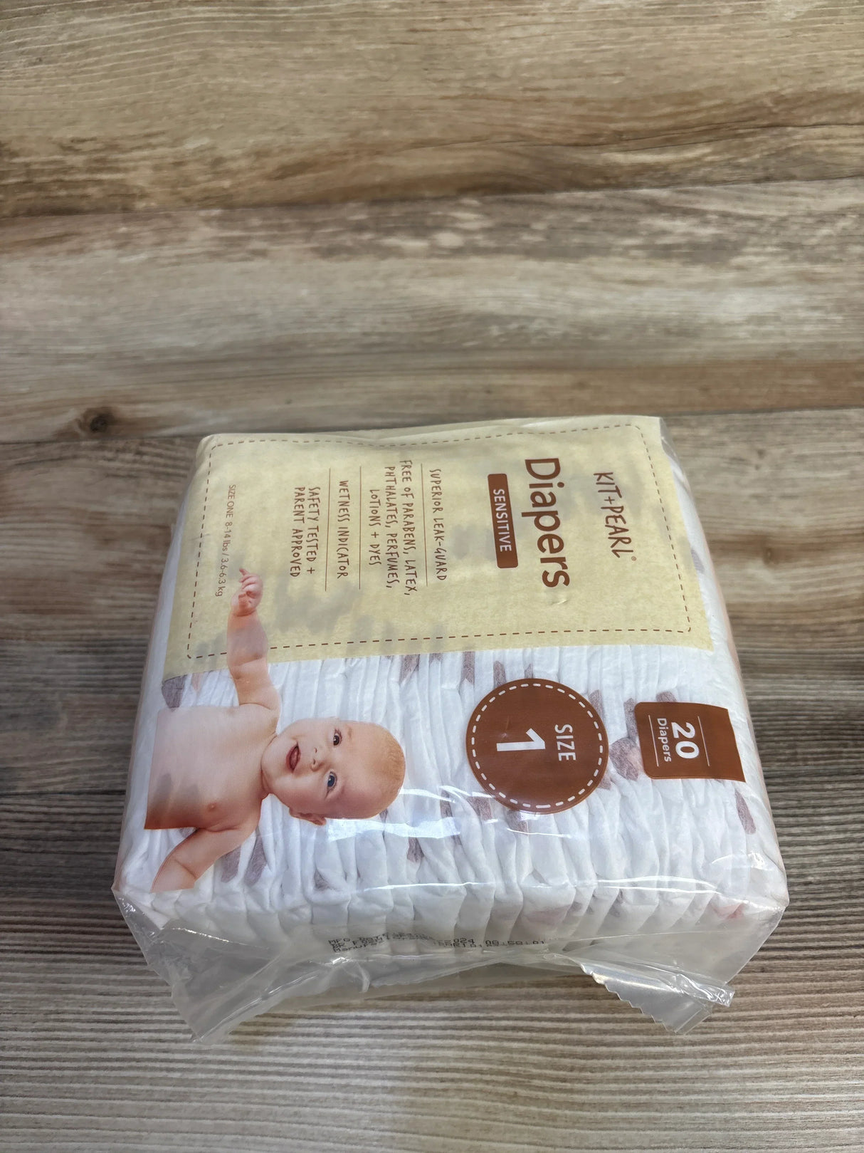 Kit+Pearl sensitive baby diapers size 1 pack of 20 on wood background