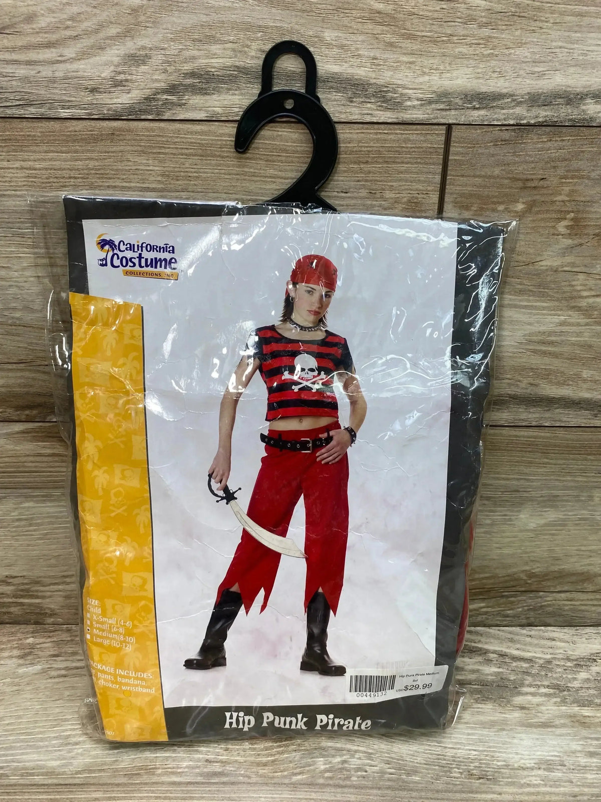 Front view of California Costume Hip Punk Pirate Girl Costume in size 8-10, showing a red and black pirate outfit in retail packaging