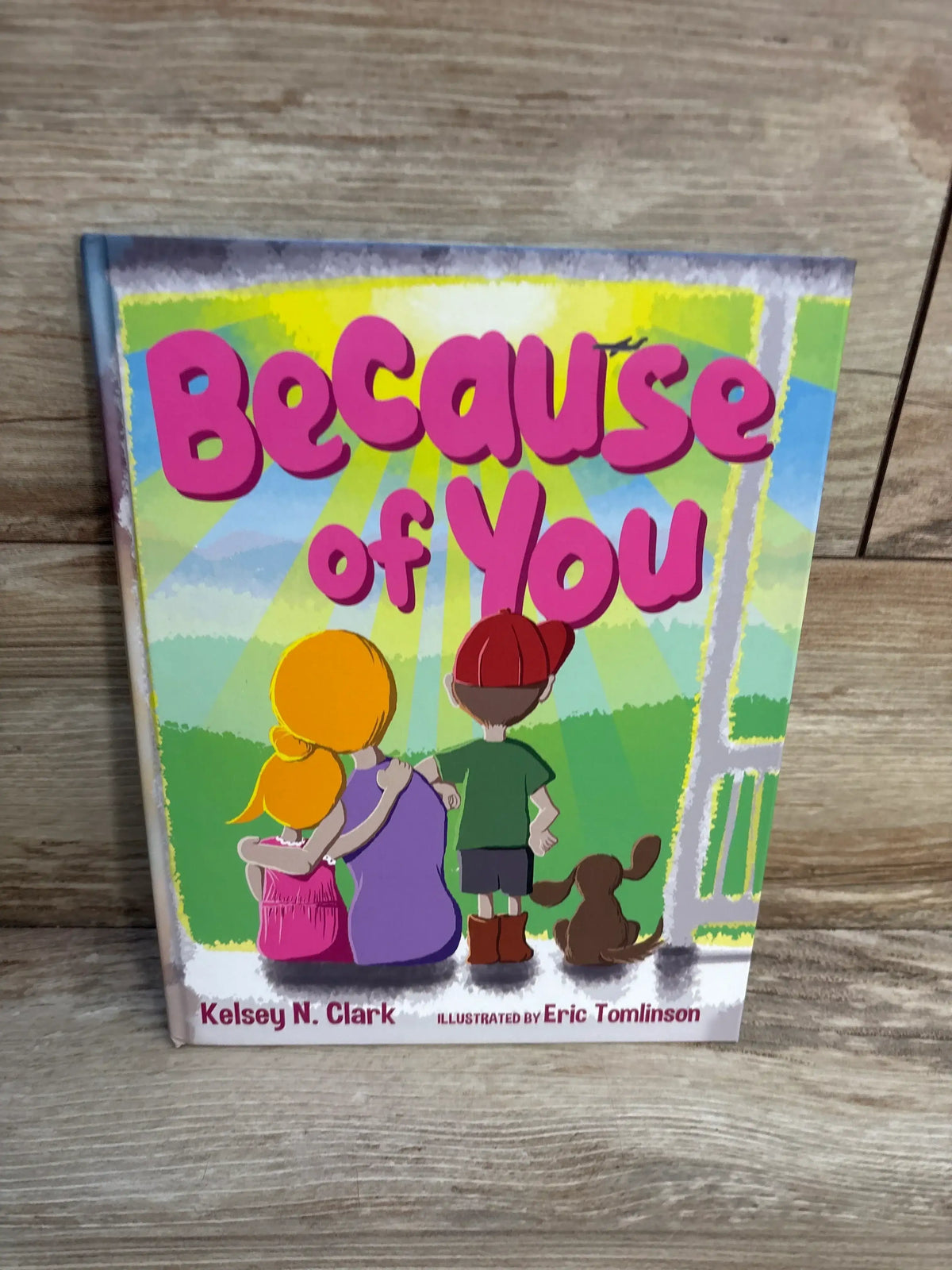 Children's book 'Because of You' with cartoon kids and a dog, perfect for resale or gifts.