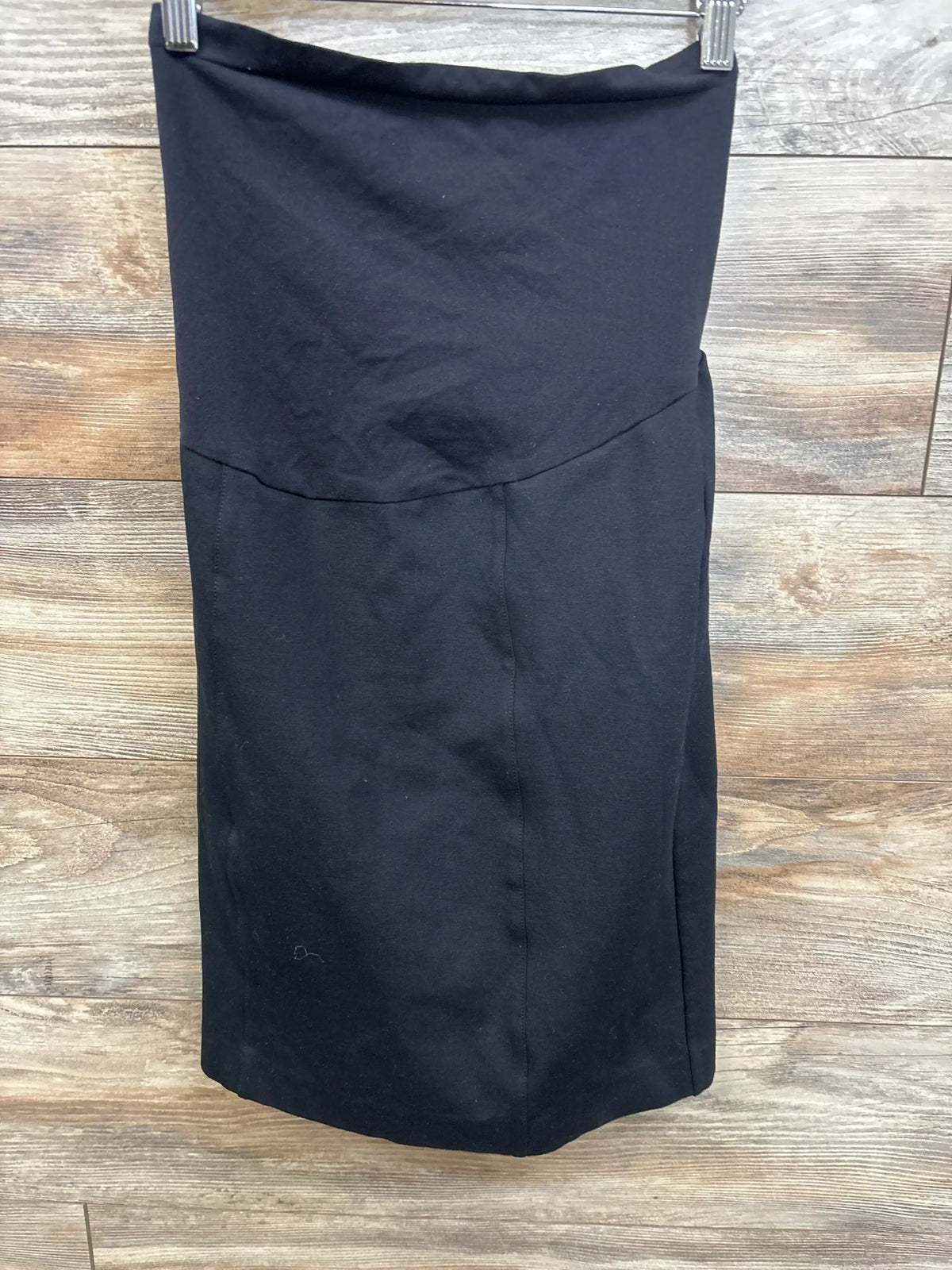 Black maternity pencil skirt with over-bump waistband, ideal for work or casual wear