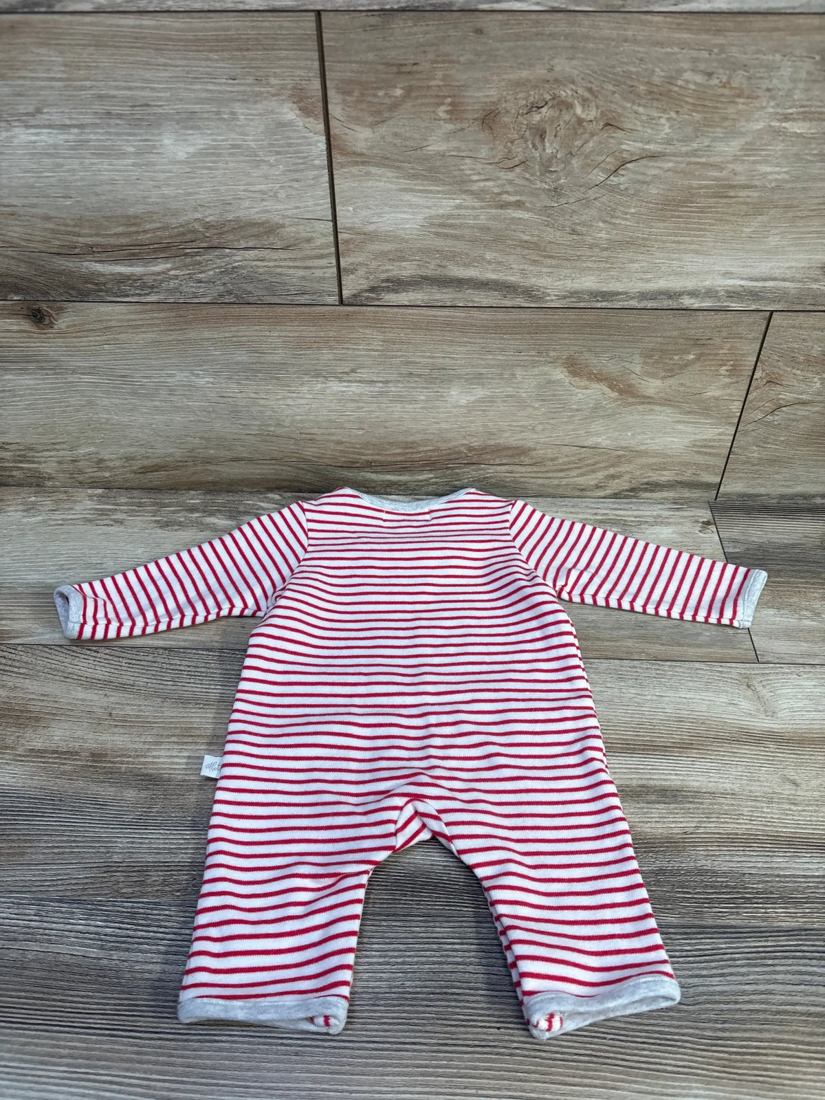 Back view of Albetta Crochet Rob Rhino Romper Red sz 0-3m showcasing red and white striped knit and long sleeves on wood plank background