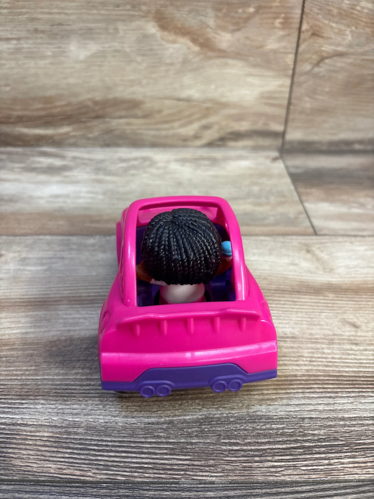 Pink toy car with doll driver, kids playset for imaginative play on wood floor