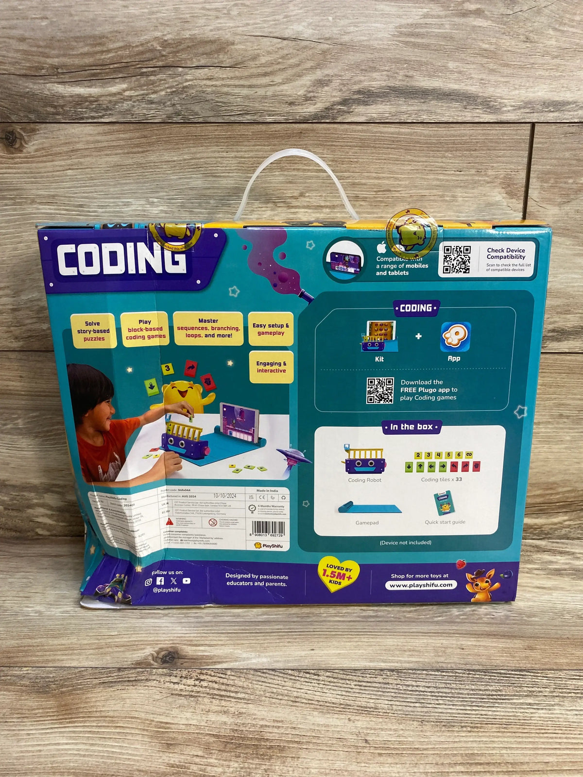 Back of PlayShifu Plugo Coding Kit box with CODING header showing robot, gamepad, 33 tiles and app interface on wood