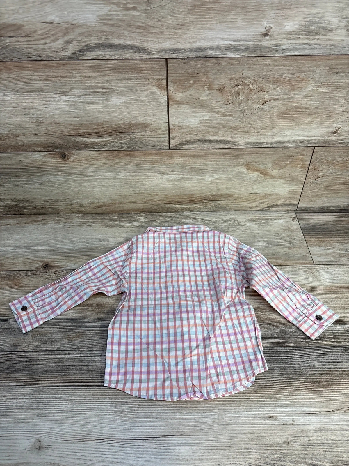 Back view of Cat & Jack 18-month toddler plaid button-up shirt showcasing long sleeves and button cuffs on wood floor background