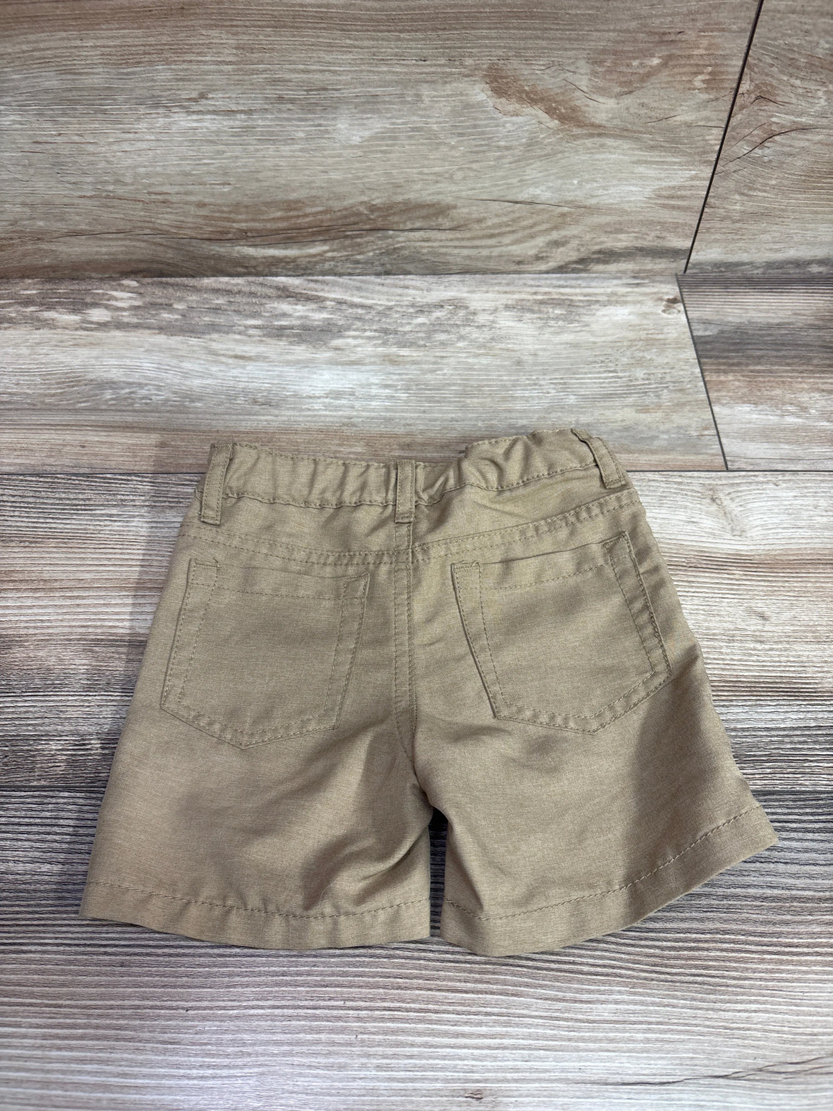 Back view of Cat & Jack quick dry chino shorts in tan for size 18 months.
