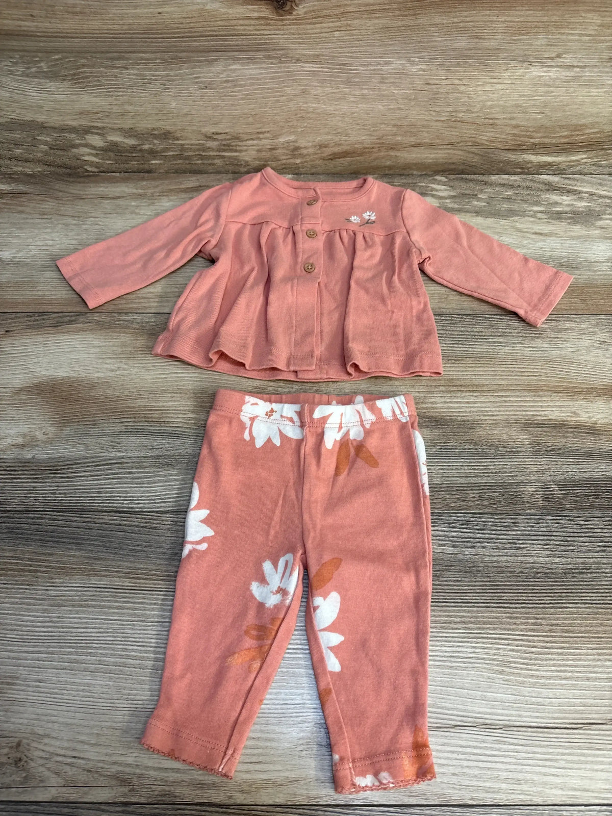 Pink toddler outfit with floral print pants and button-front top, perfect for baby girls' casual wear.