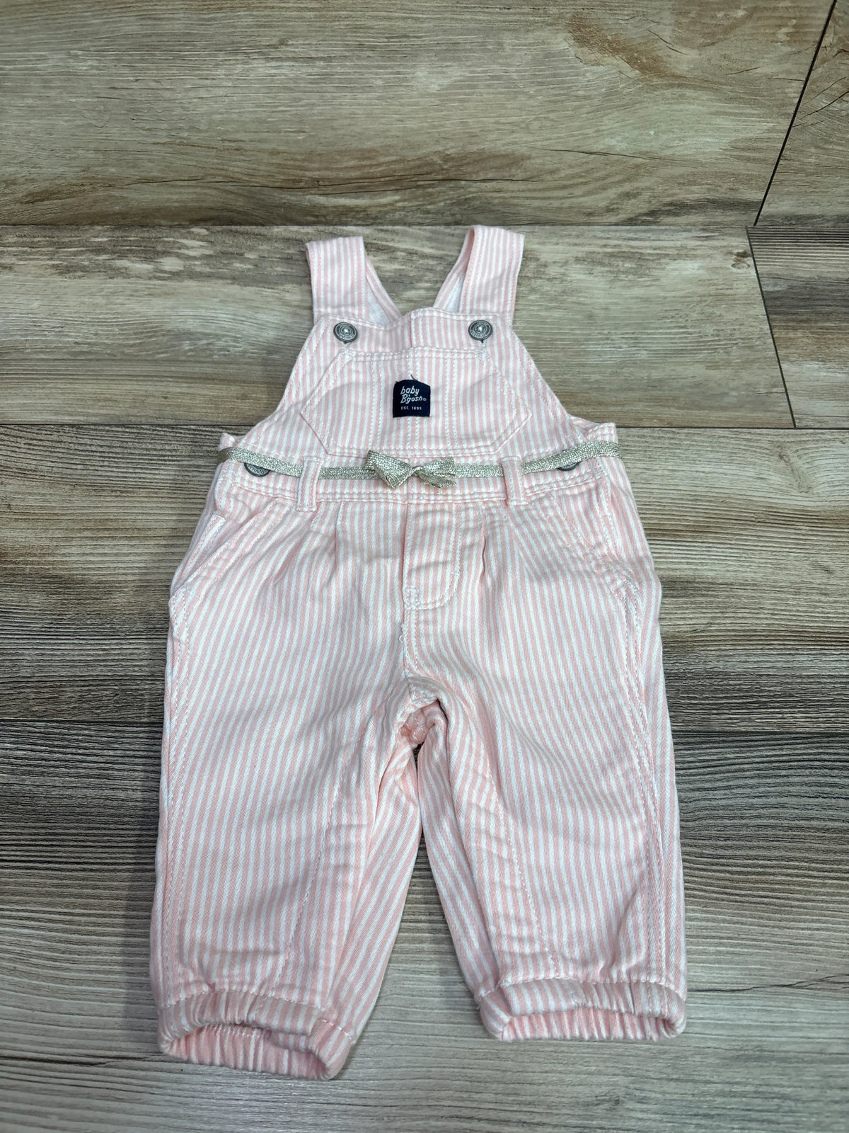 Pink and white striped baby overalls with a silver bow belt from Me n Mommy To Be