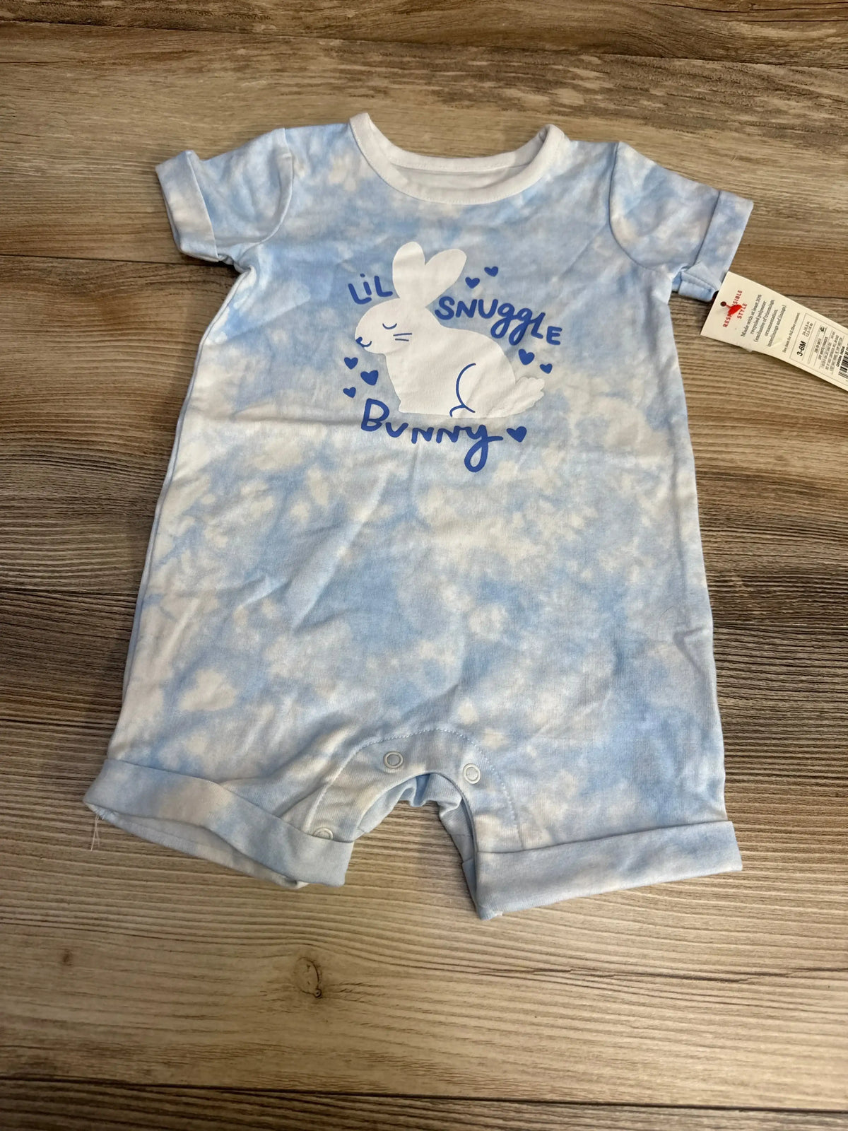Front view of Cat and Jack Lil Snuggle Bunny romper in blue, size 3 to 6 months, with short sleeves and white bunny graphic