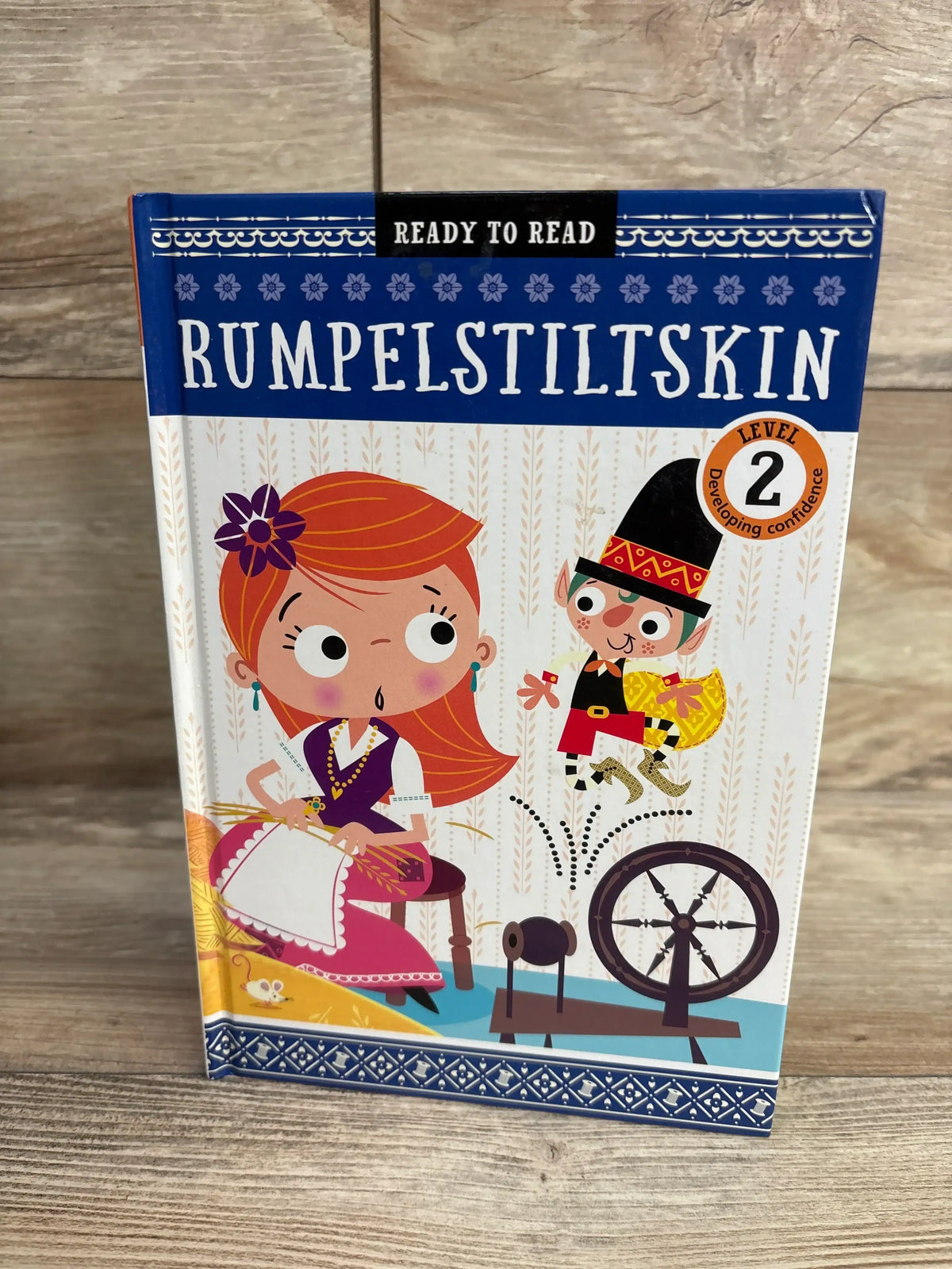 Children's Rumpelstiltskin Level 2 reading book with illustrated cover