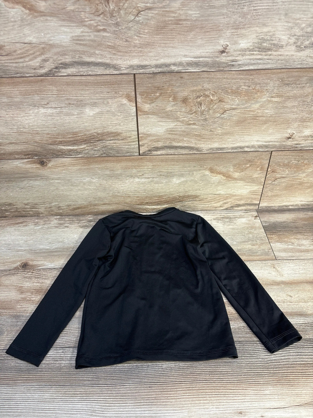 Back view of black Cat & Jack full zip rash guard shirt, size 4T, showcasing long sleeves on a wood-look floor