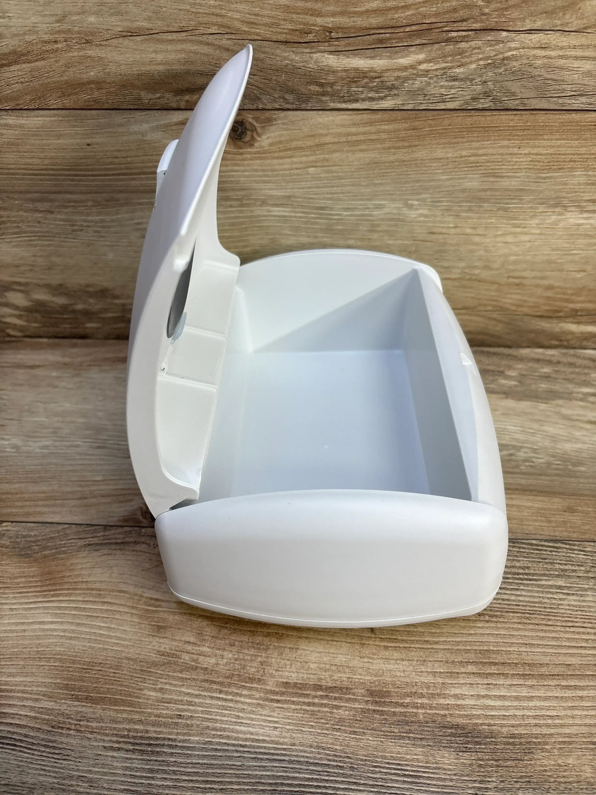 Front view of Prince Lionheart Ultimate Wipes Warmer showcasing curved lid and compact base on white background