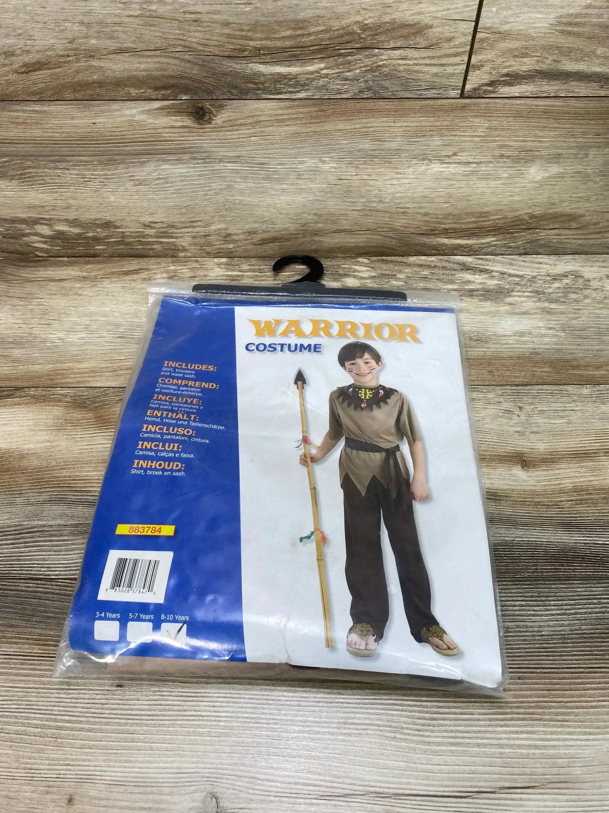 Packaged Rubie’s Warrior Costume sz 8-10 showing a brown tunic, dark trousers, and sash