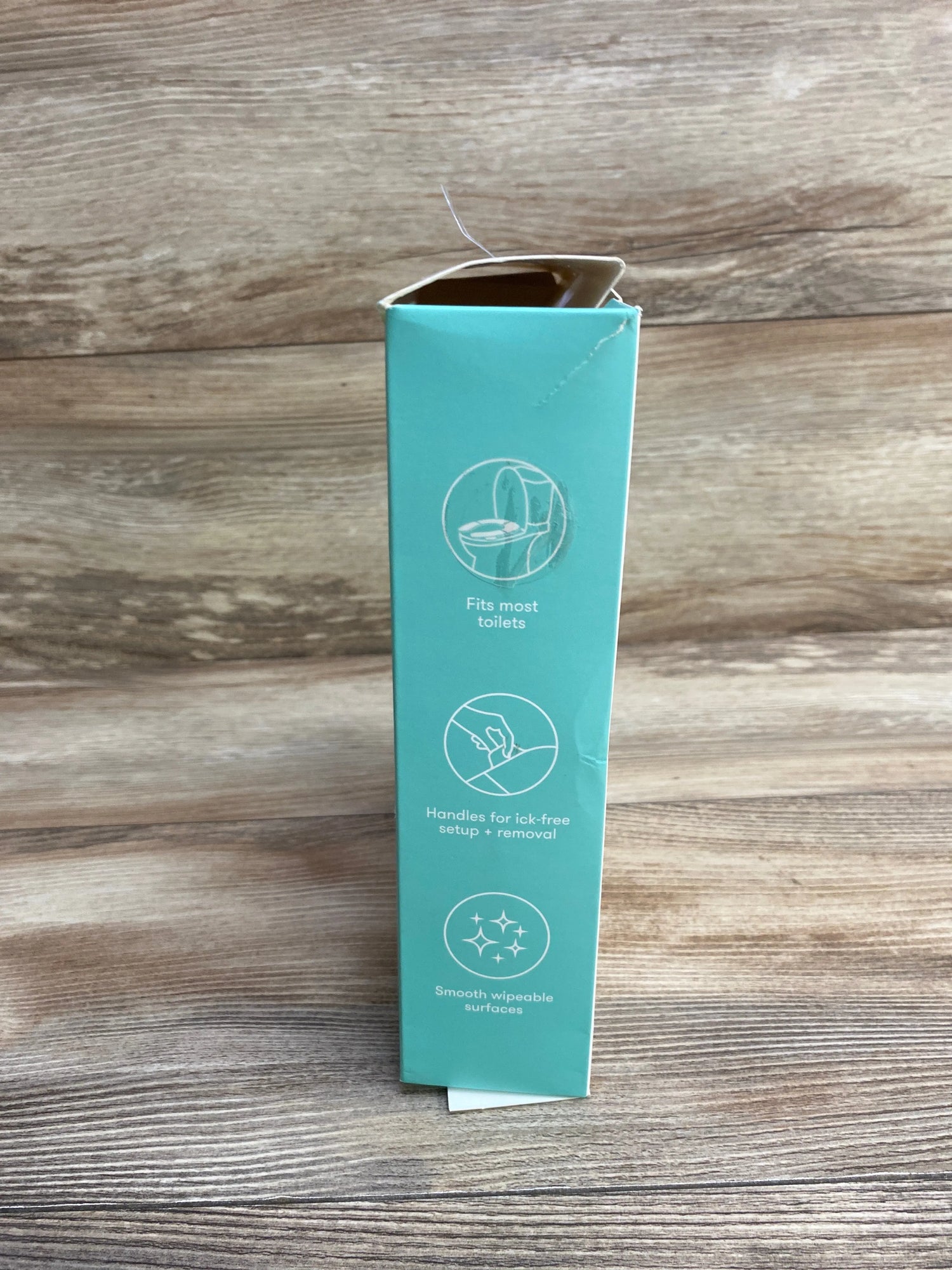 Frida Baby Fold-And-Go Potty Seat - White