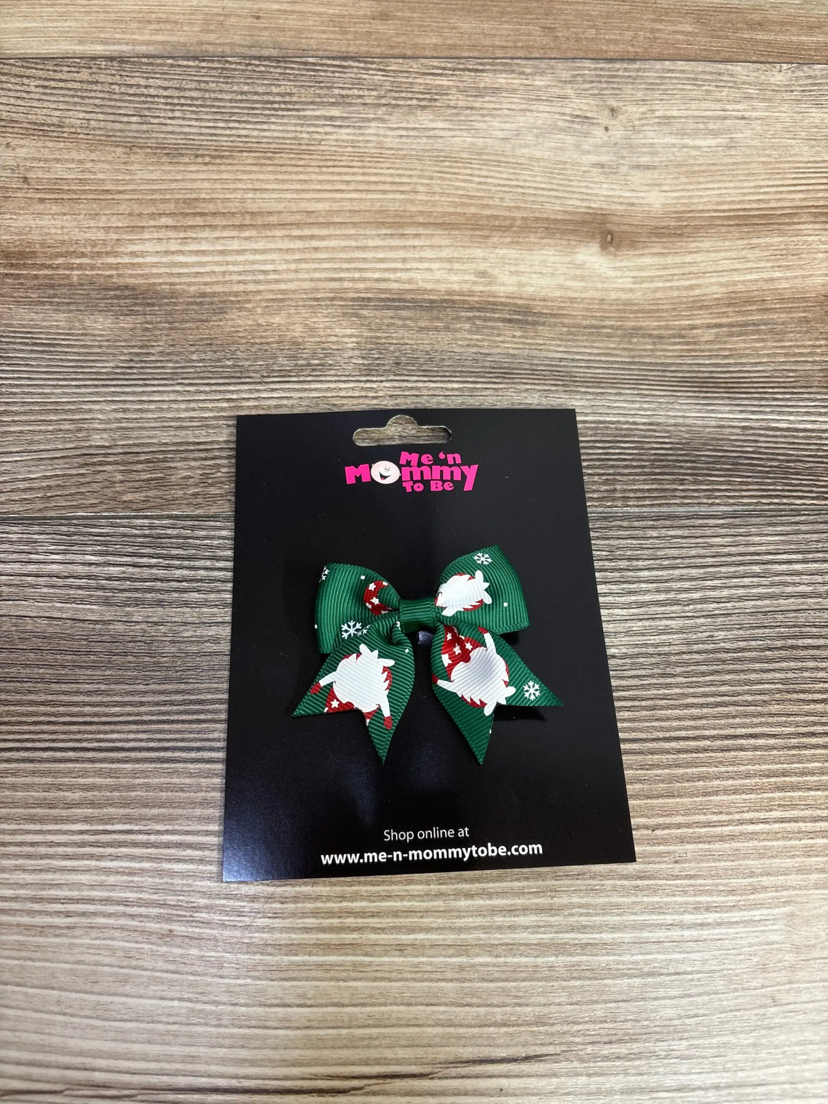 Green holiday bow with snowmen, perfect for kids' Christmas outfits
