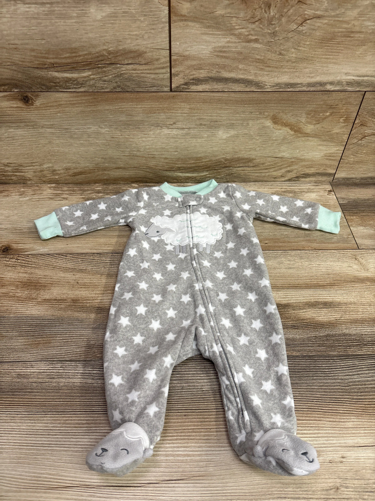 Front view of gray Simple Joys blanket sleeper with white star pattern, sheep appliqué, front zipper, and covered feet