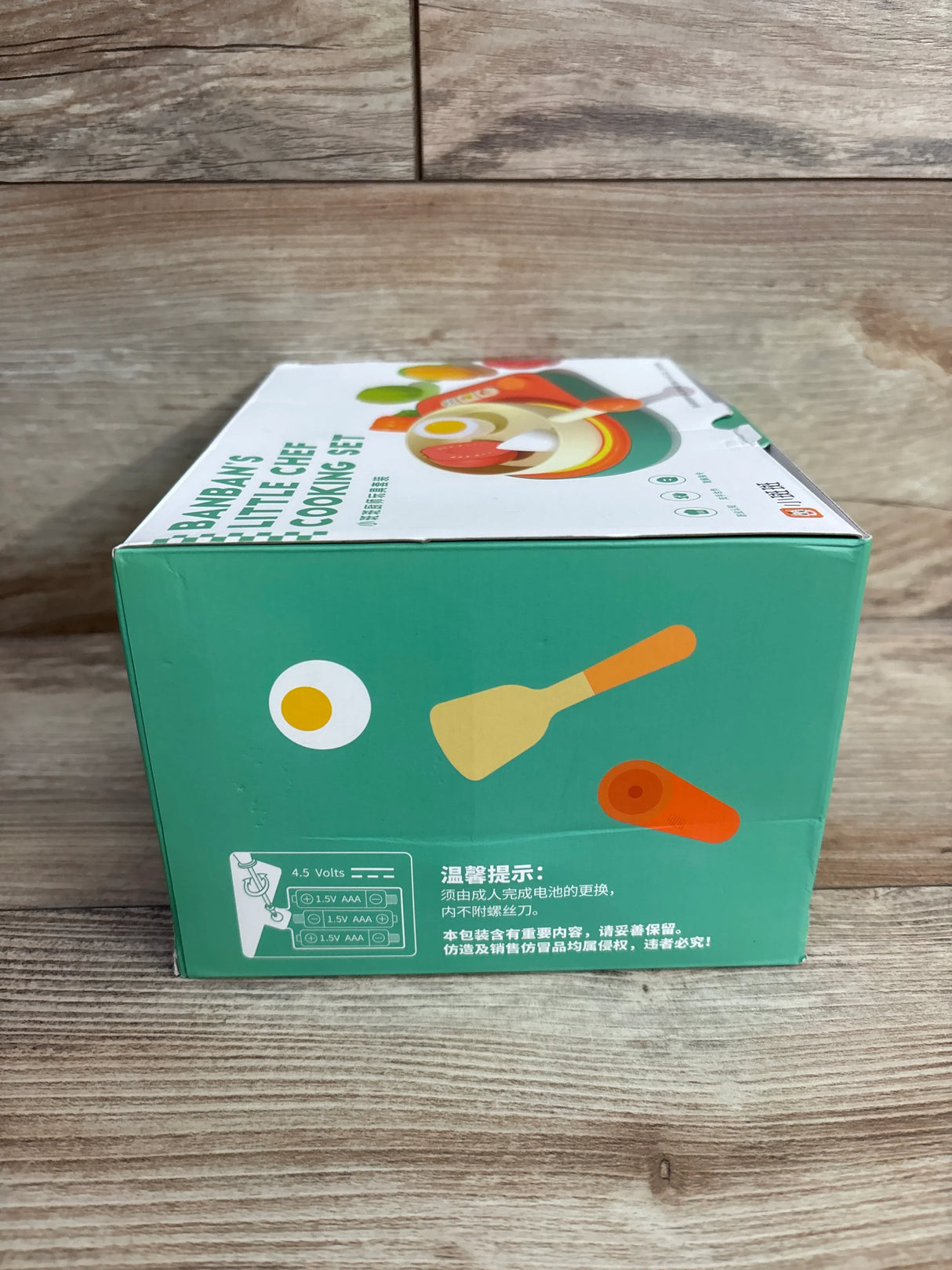 Green boxed Peabanys Little Chef Cooking Set for children with cartoon egg, spatula, and carrot illustrations