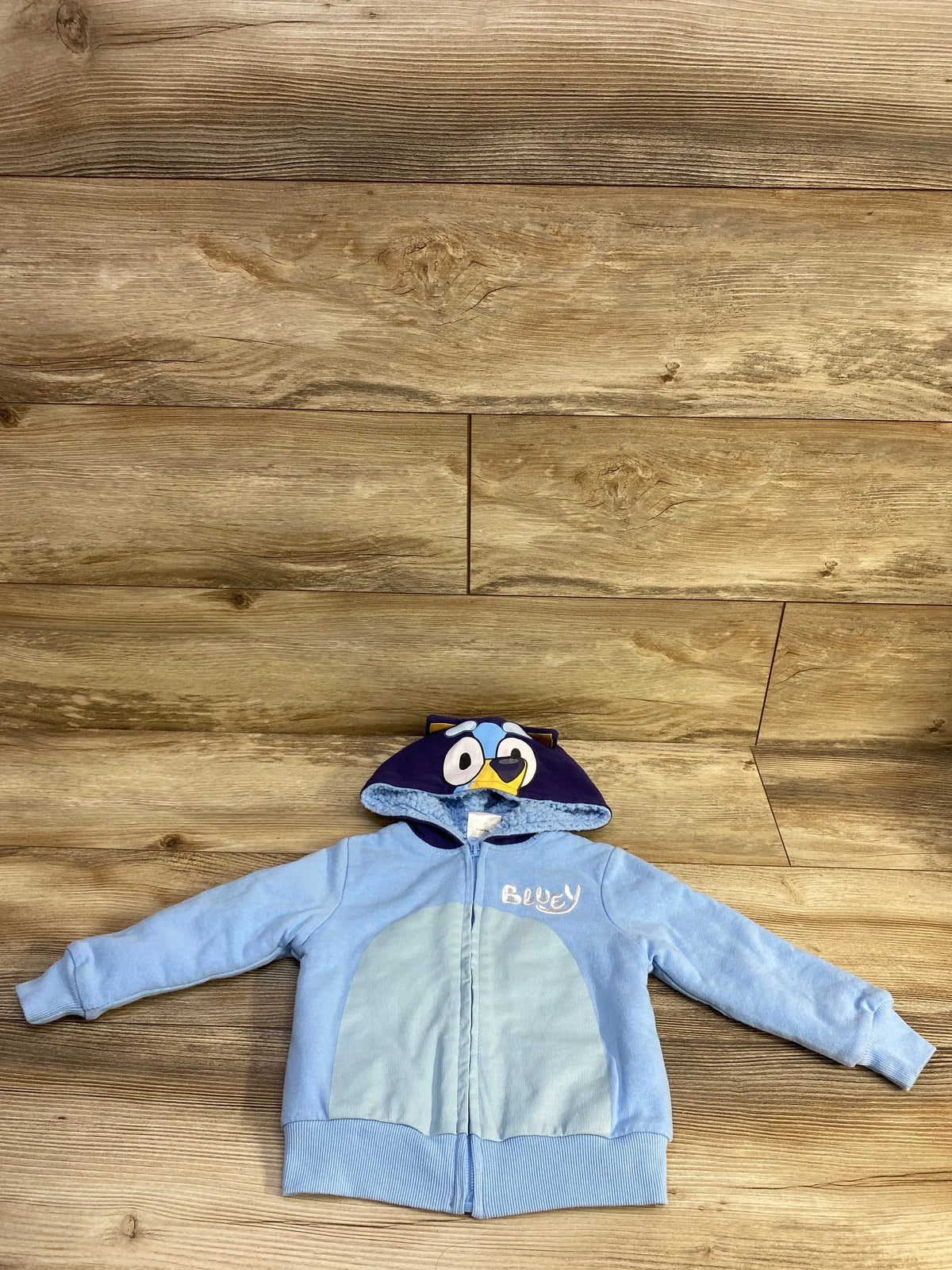 Bluey lined full zip jacket in blue for toddlers, featuring a character hood