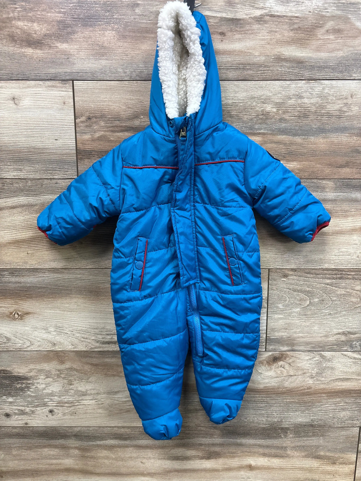 Blue Ben Sherman baby snowsuit with white fleece-lined hood, size 3-6 months.