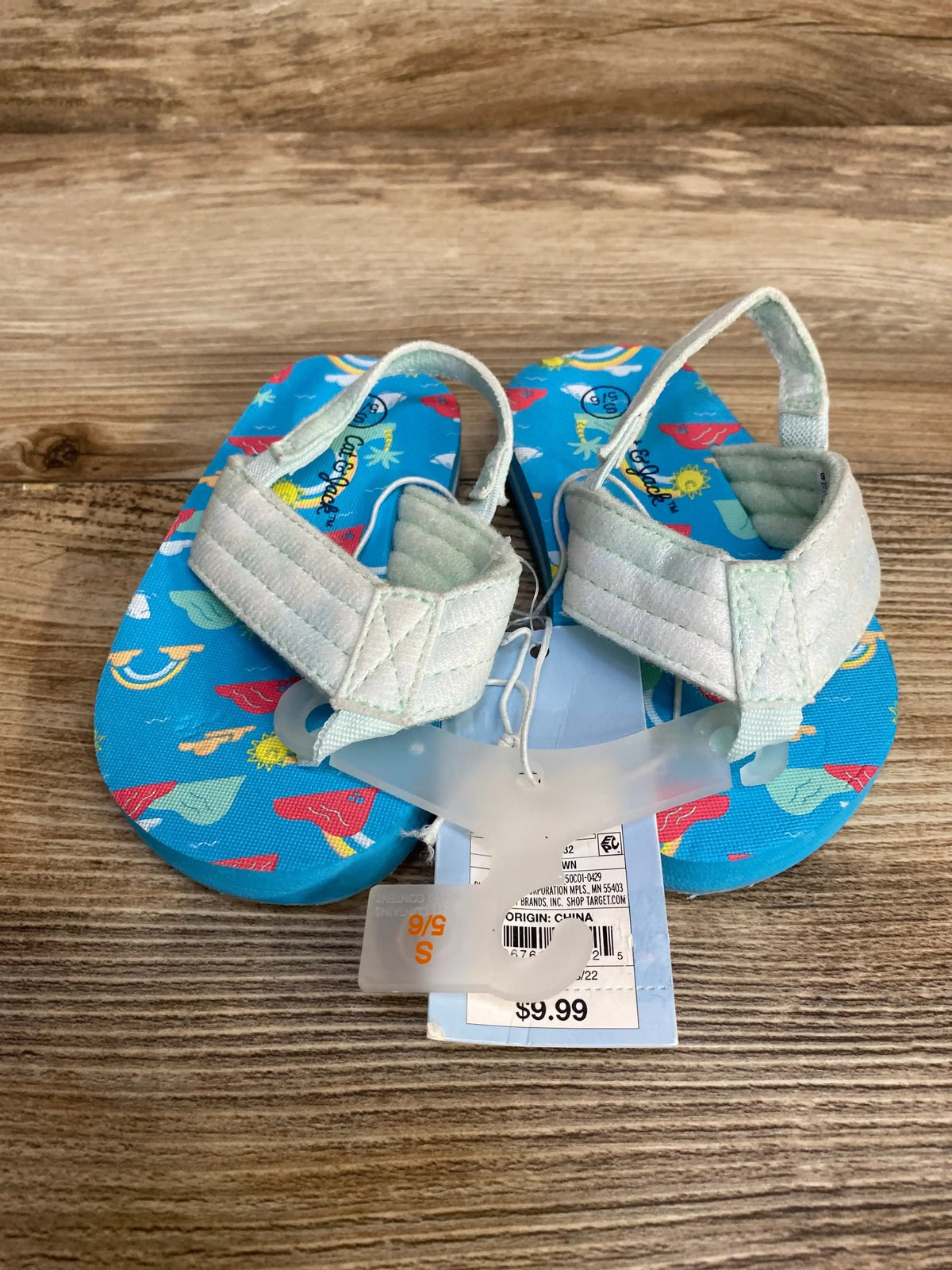 Top view of Cat & Jack Shawn toddler sandals, blue fish-pattern footbeds, mint padded Velcro straps, visible size tag 5/6