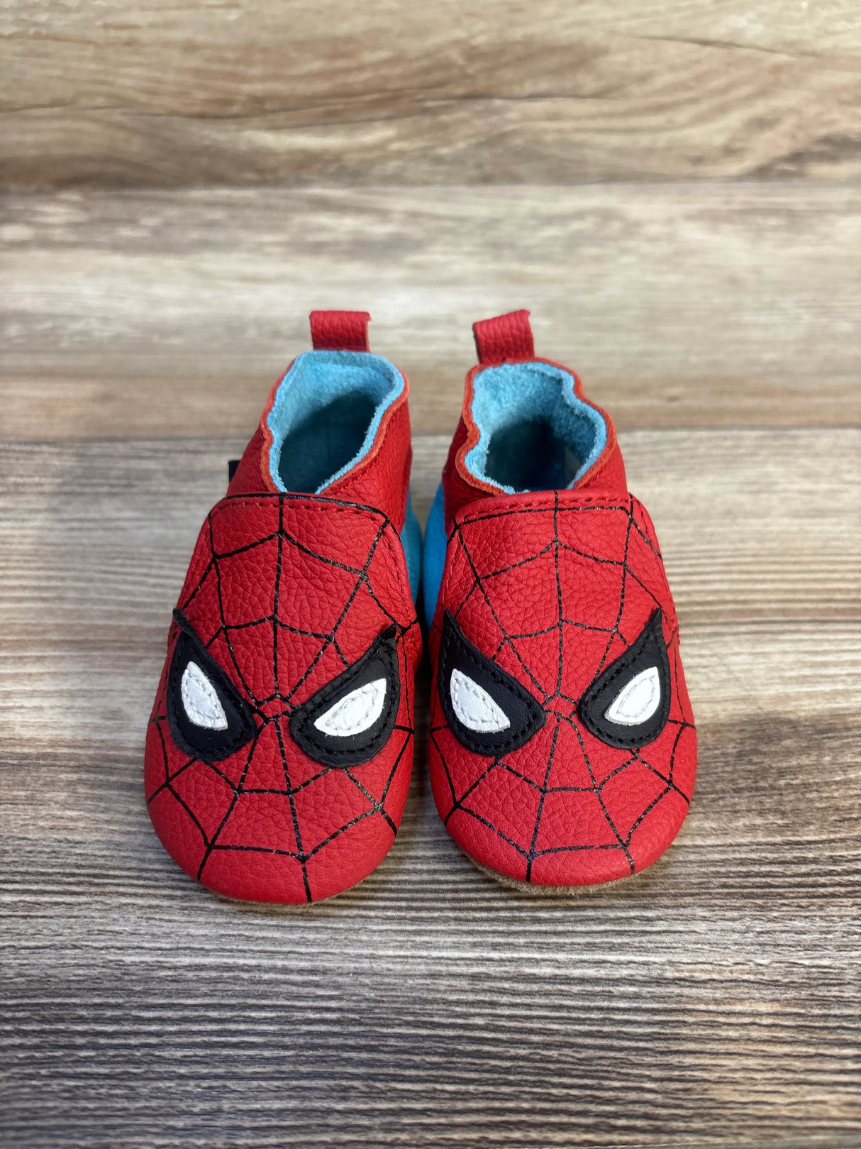 Spider-Man baby shoes with red web design, blue lining, soft sole for infants, kids footwear