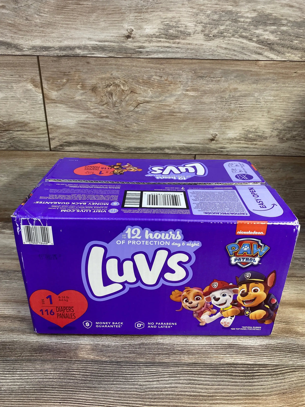 Front view of Luvs Paw Patrol size 1 diaper pack showing Paw Patrol character graphics and 116 ct count on white background