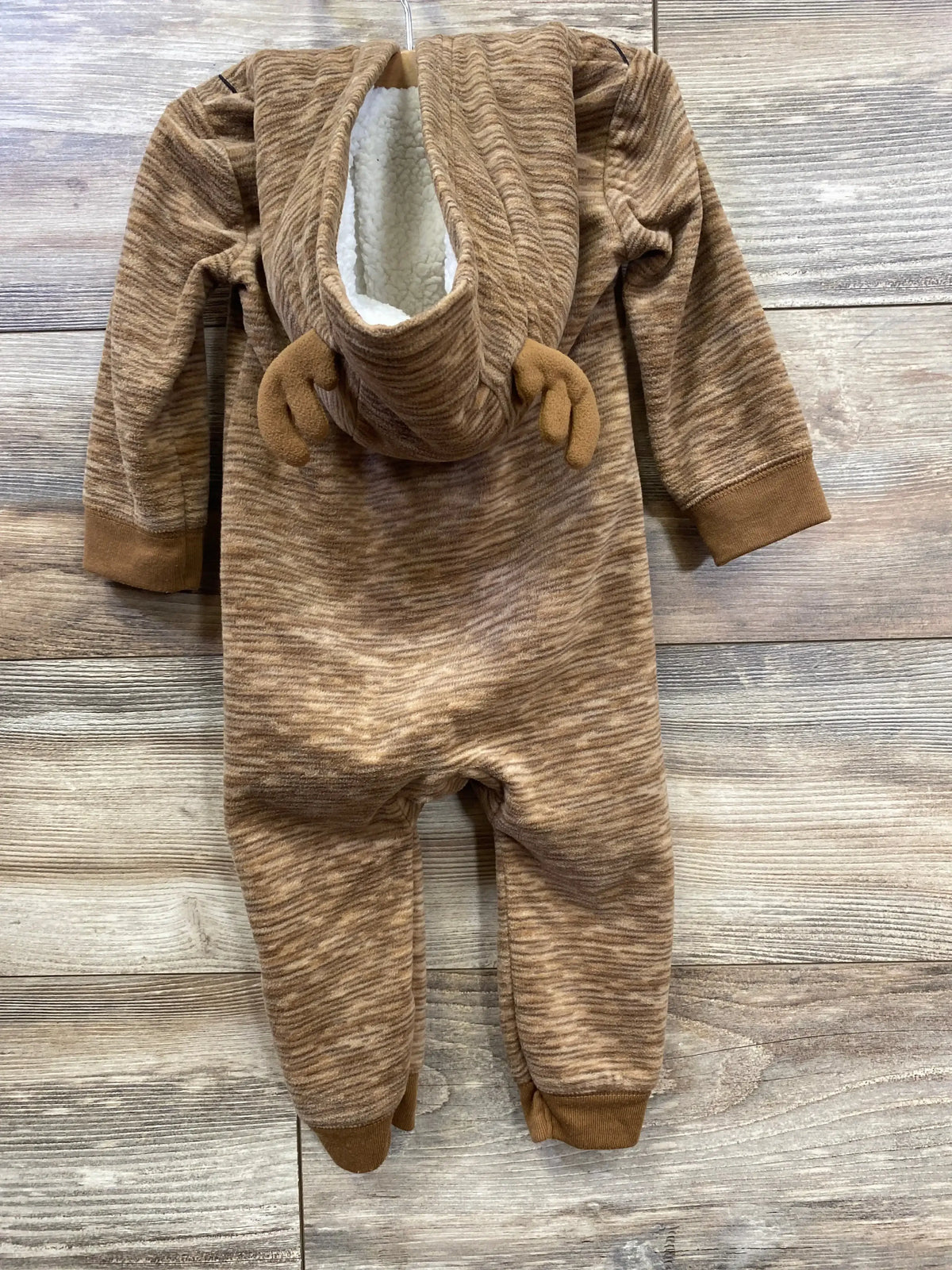 Brown striped baby onesie with cozy fleece lining and hood, perfect for infant sleepwear or cozy baby clothes.