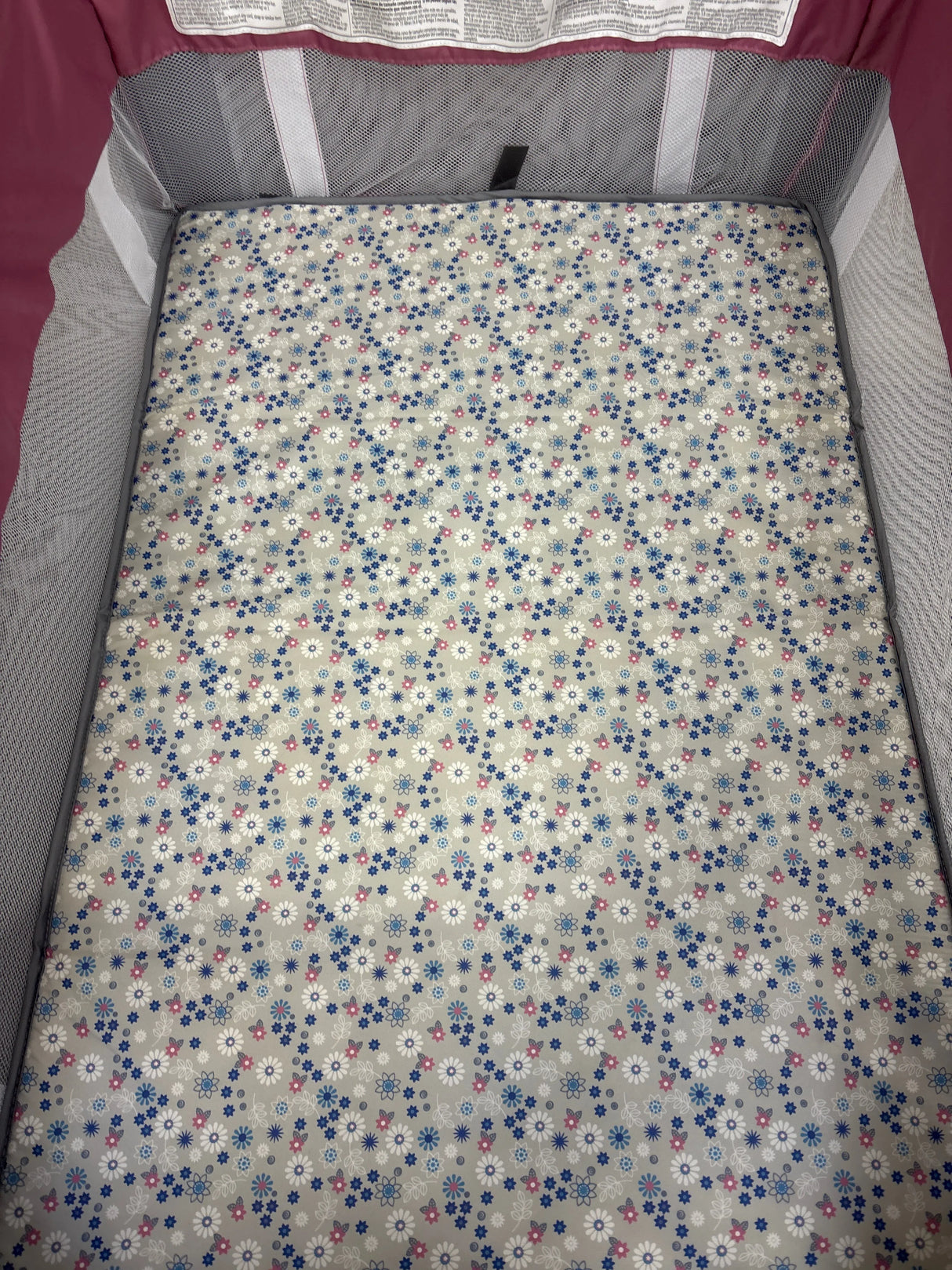 Baby Trend Nursery Den Playard with Rocking Cradle - Daisy Pink