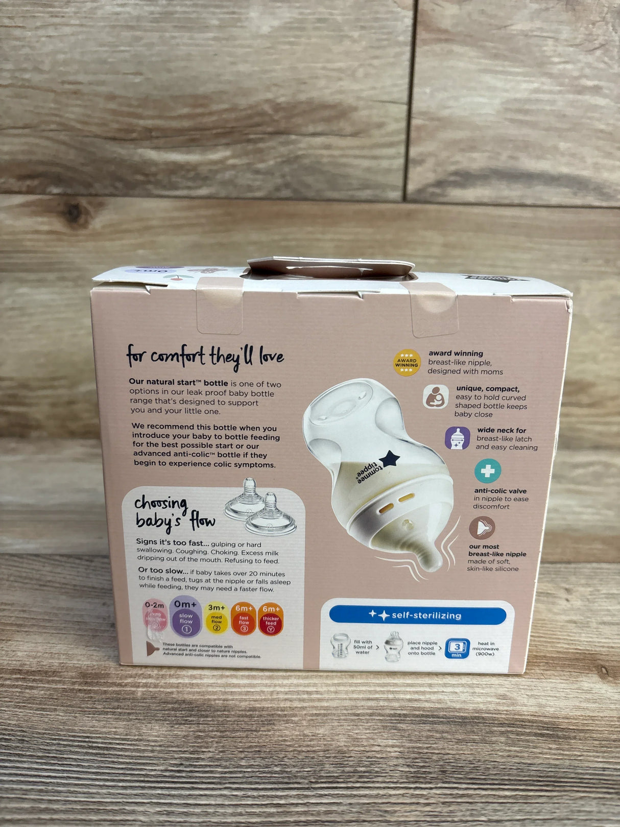 Back of Tommee Tippee Natural Start 9oz pink 2-pack box showing anti-colic nipple, flow options, and self-sterilizing steps