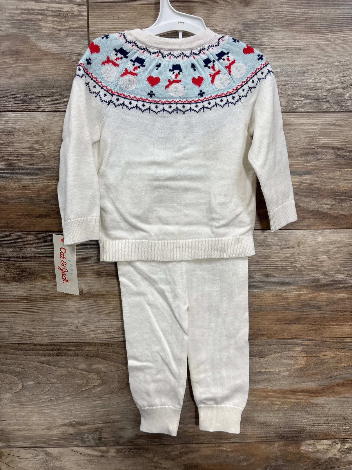 Baby white knit sweater and pants set with snowman and heart design, Cat & Jack tag visible
