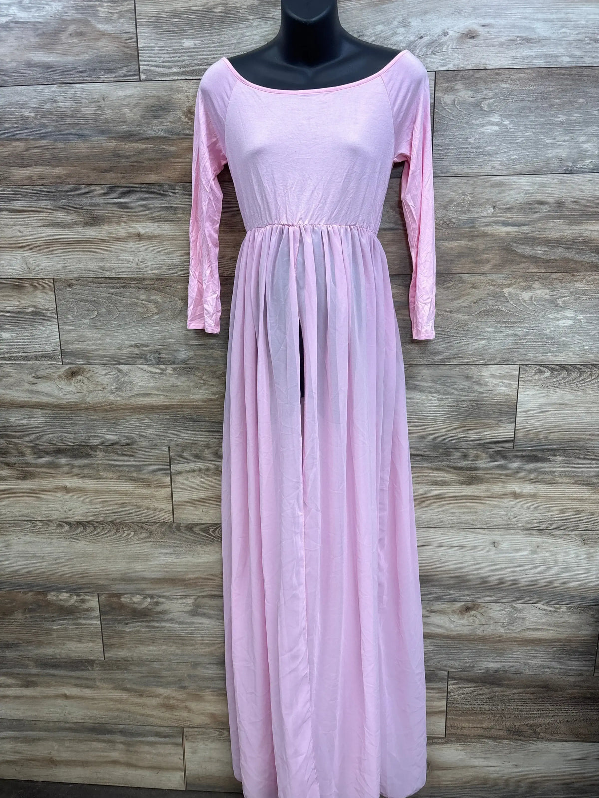 Front view of Odeerbi maternity off-shoulder long-sleeve pink maxi dress showing ruched bodice and flowing skirt on white background