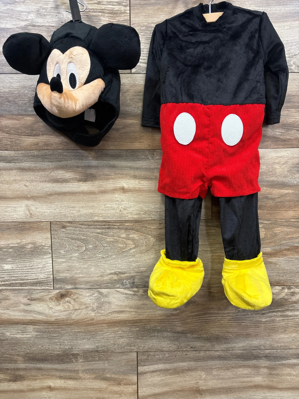 Mickey Mouse costume with hat, red shorts, black top, and yellow shoes for kids