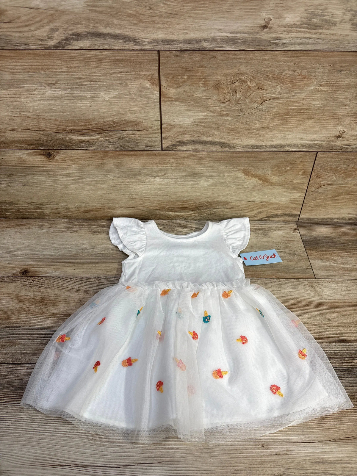 New white Cat & Jack toddler tulle dress with colorful ice cream cone patterns