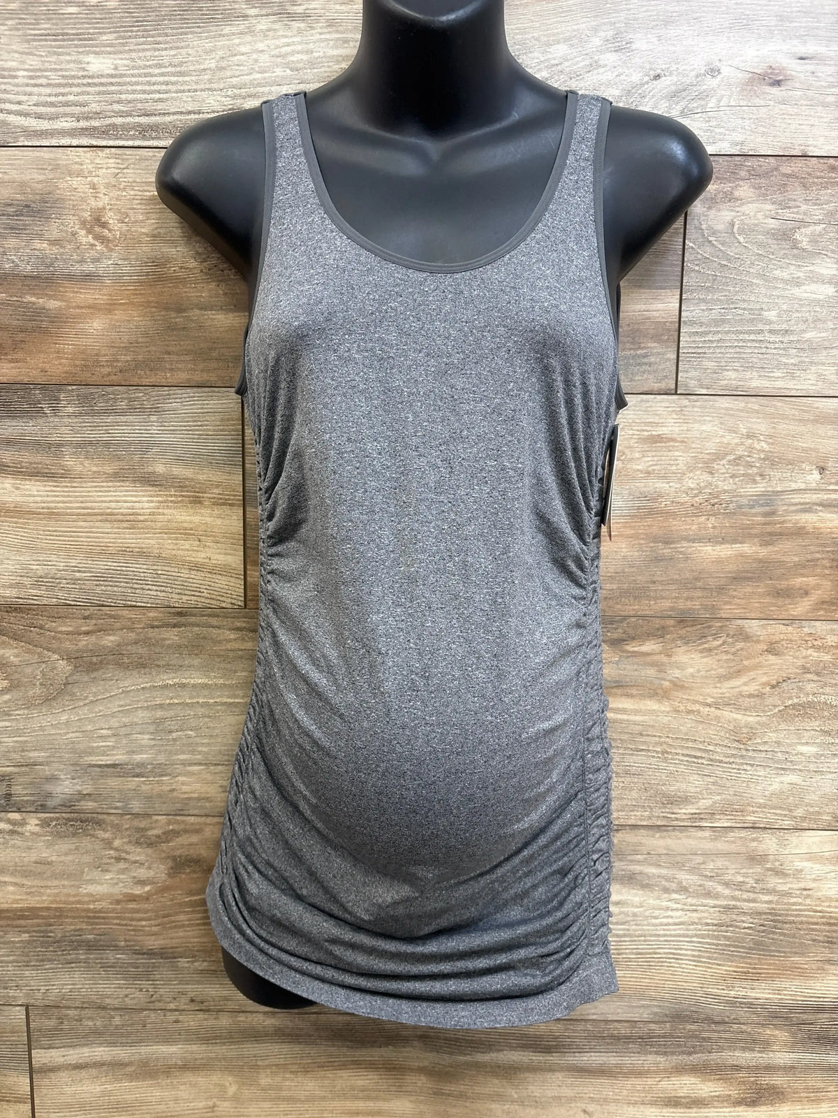 Front view of Isabel maternity ruched tank top, heather grey, showing side ruching and scoop neckline on black mannequin