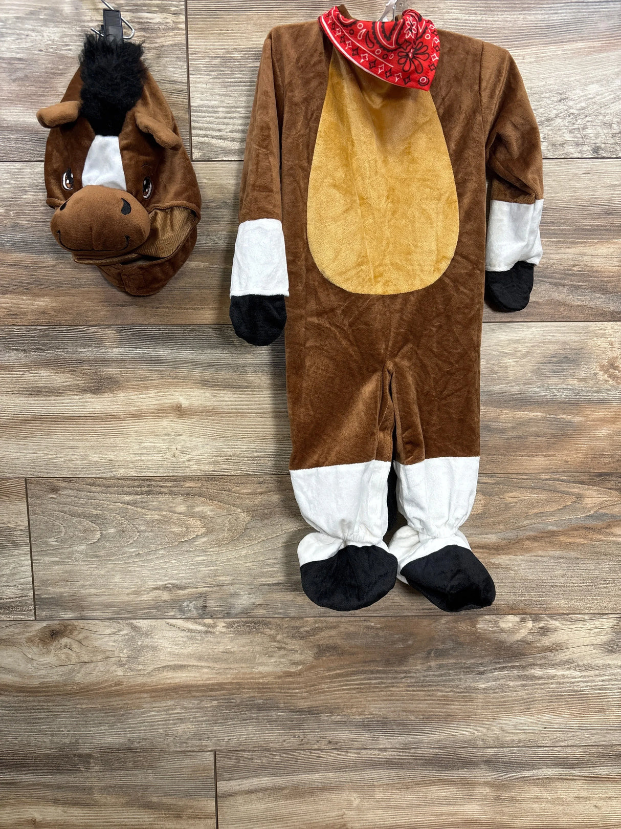 Kids horse costume with red bandana, brown and white plush design, perfect for Halloween or dress-up