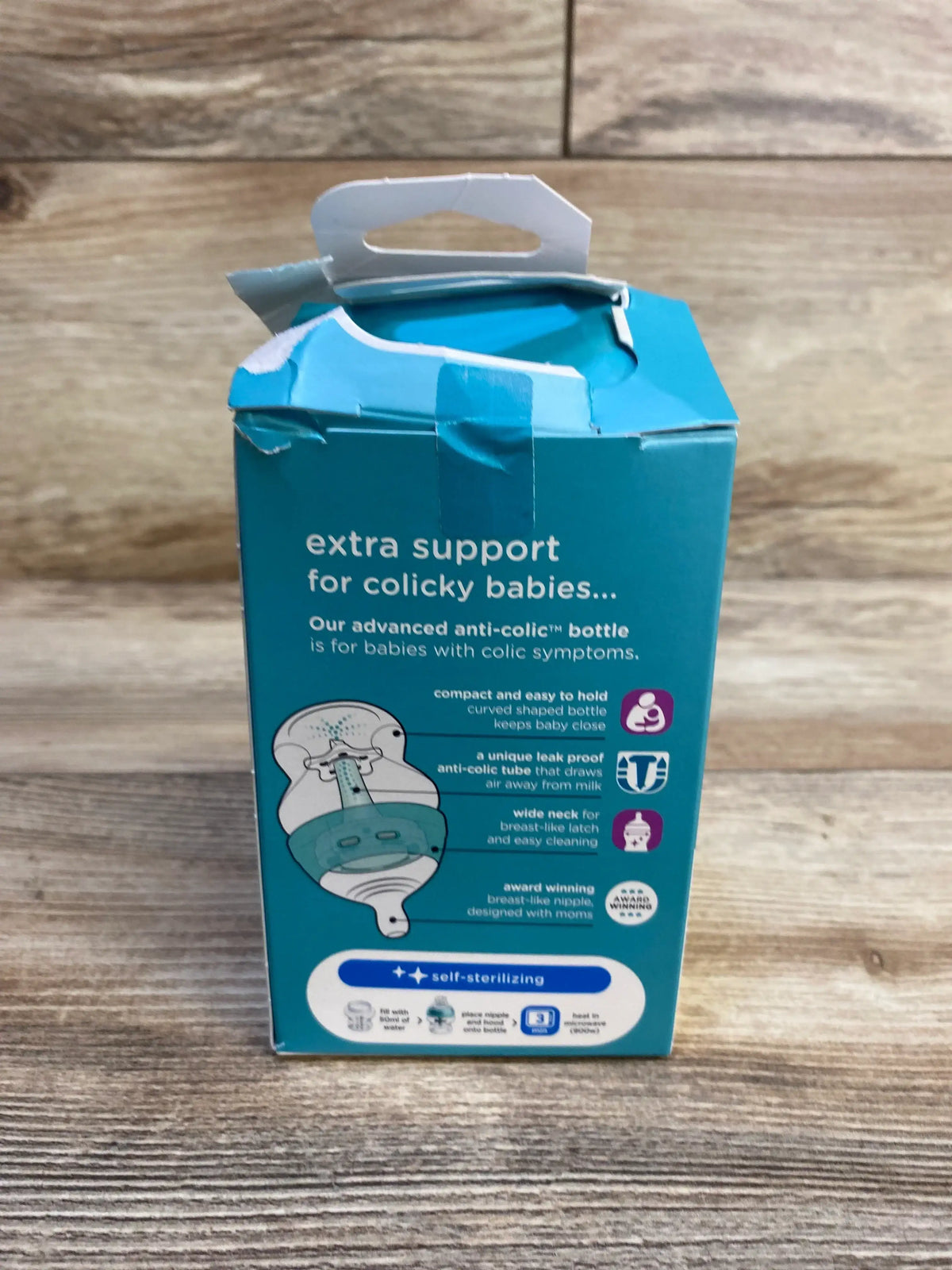 Front of Tommee Tippee Anti-Colic 5oz box showing headline extra support for colicky babies and self-sterilizing label